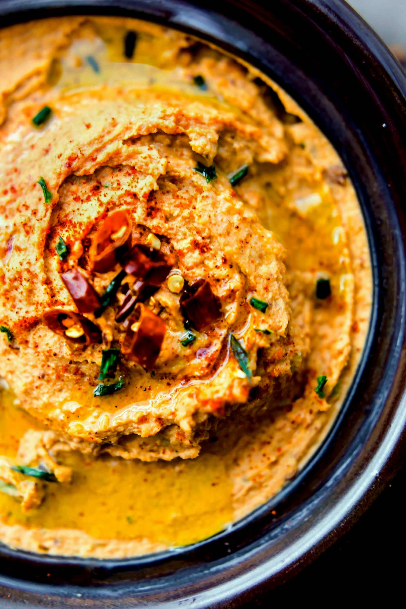 Chipotle Black Eyed Peas Hummus with spicy smokey flavor! A healthy twist on classic hummus with black eyed peas in place of garbanzo beans! Perfect for a snack or appetizer. Easy, vegan, gluten free. www.cottercrunch.com @cottercrunch