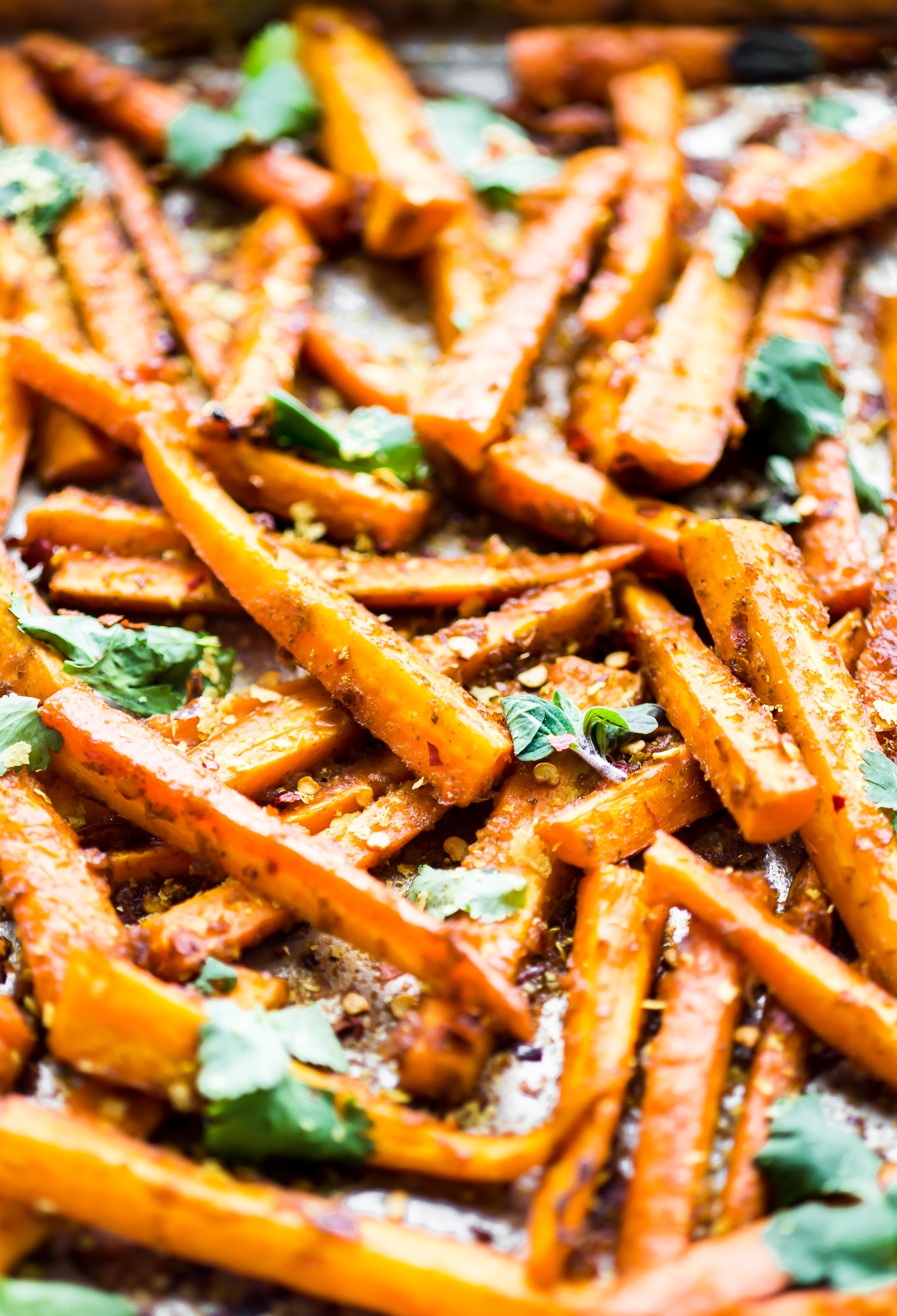 These Peri Peri oven baked carrot fries are gonna knock your socks off ya'll! The homemade Peri Peri Sauce is the key to making these carrot fries more flavorful. Just marinate slice carrots in the sauce, bake, and enjoy! A paleo, vegan, and whole 30 friendly snack with a kick of spice.