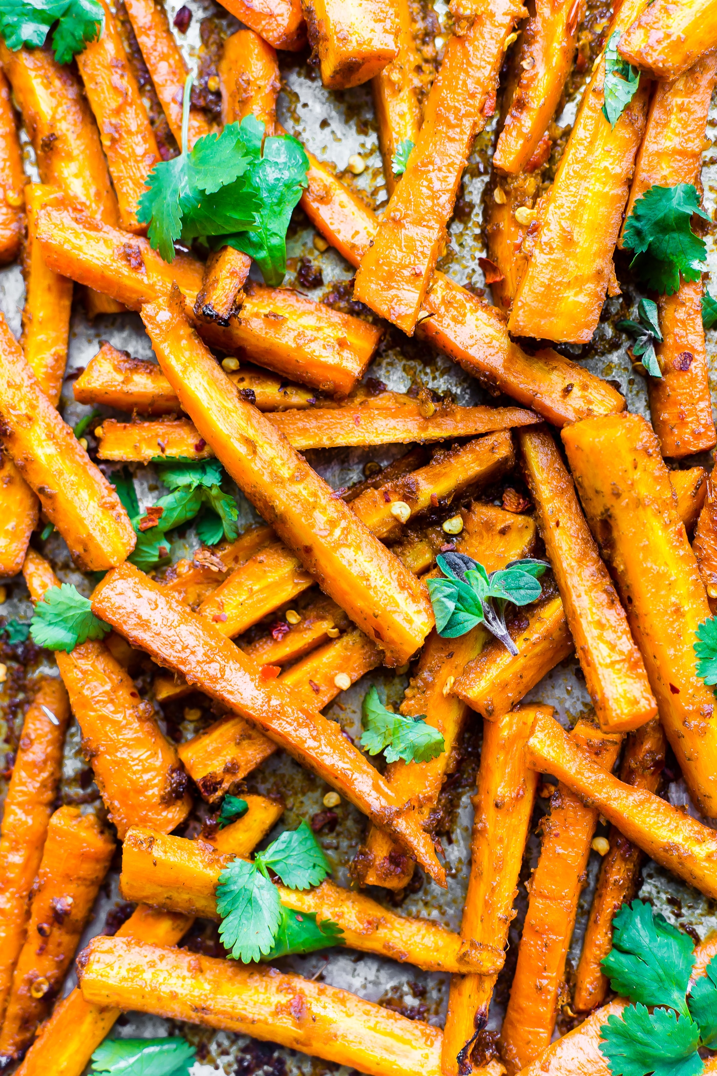 These Peri Peri oven baked carrot fries are gonna knock your socks off ya'll! The homemade Peri Peri Sauce is the key to making these carrot fries more flavorful. Just marinate slice carrots in the sauce, bake, and enjoy! A paleo, vegan, and whole 30 friendly snack with a kick of spice.