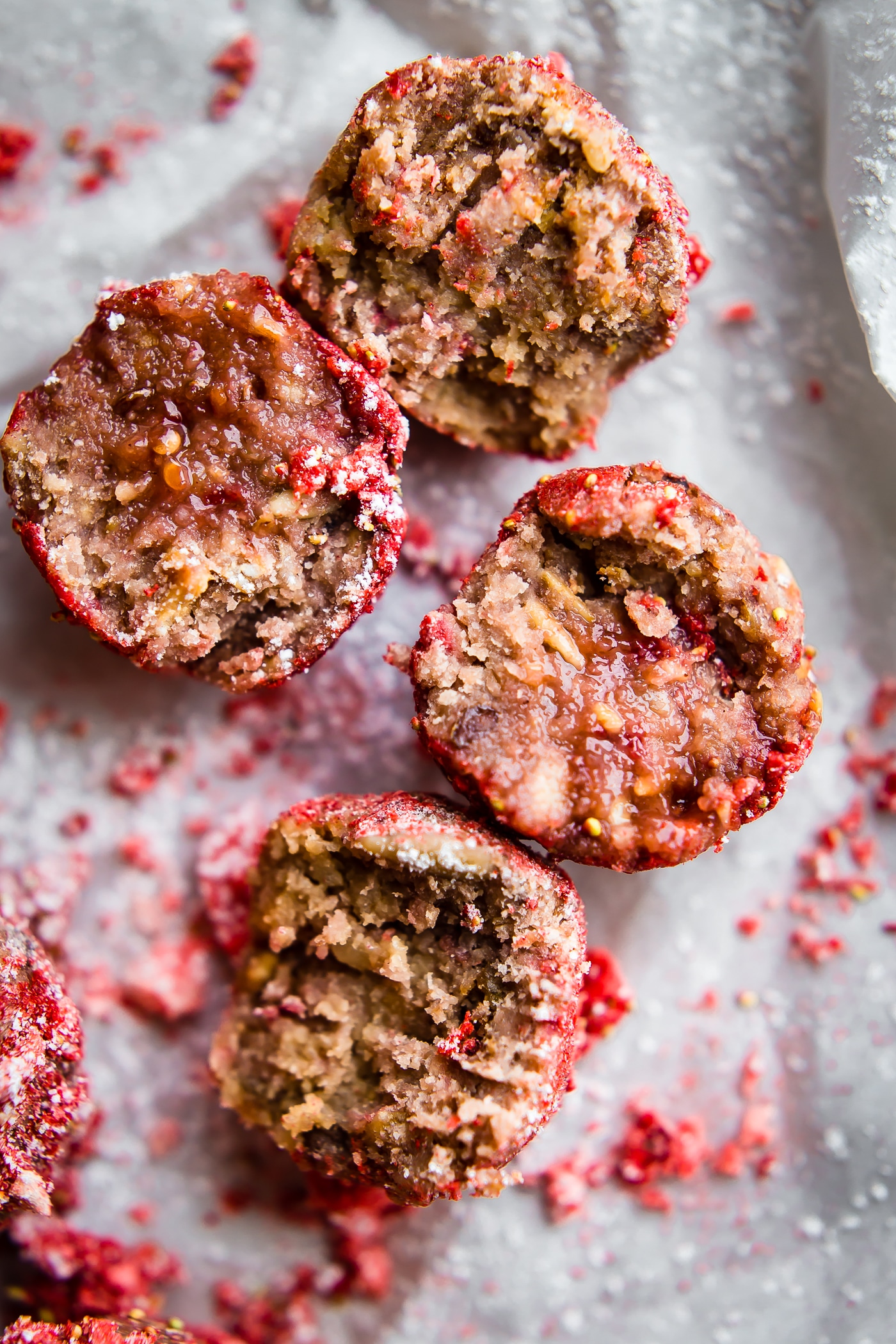 These Vegan No Bake Strawberry Cake Bliss Bites are the bite size healthy dessert. Just dried Strawberries, cashew cream, gluten free granola/flour, and a sweet jam filling! Tart and tasty! A vegan cake bite that requires no baking, just blissfully nourishing. Paleo friendly.