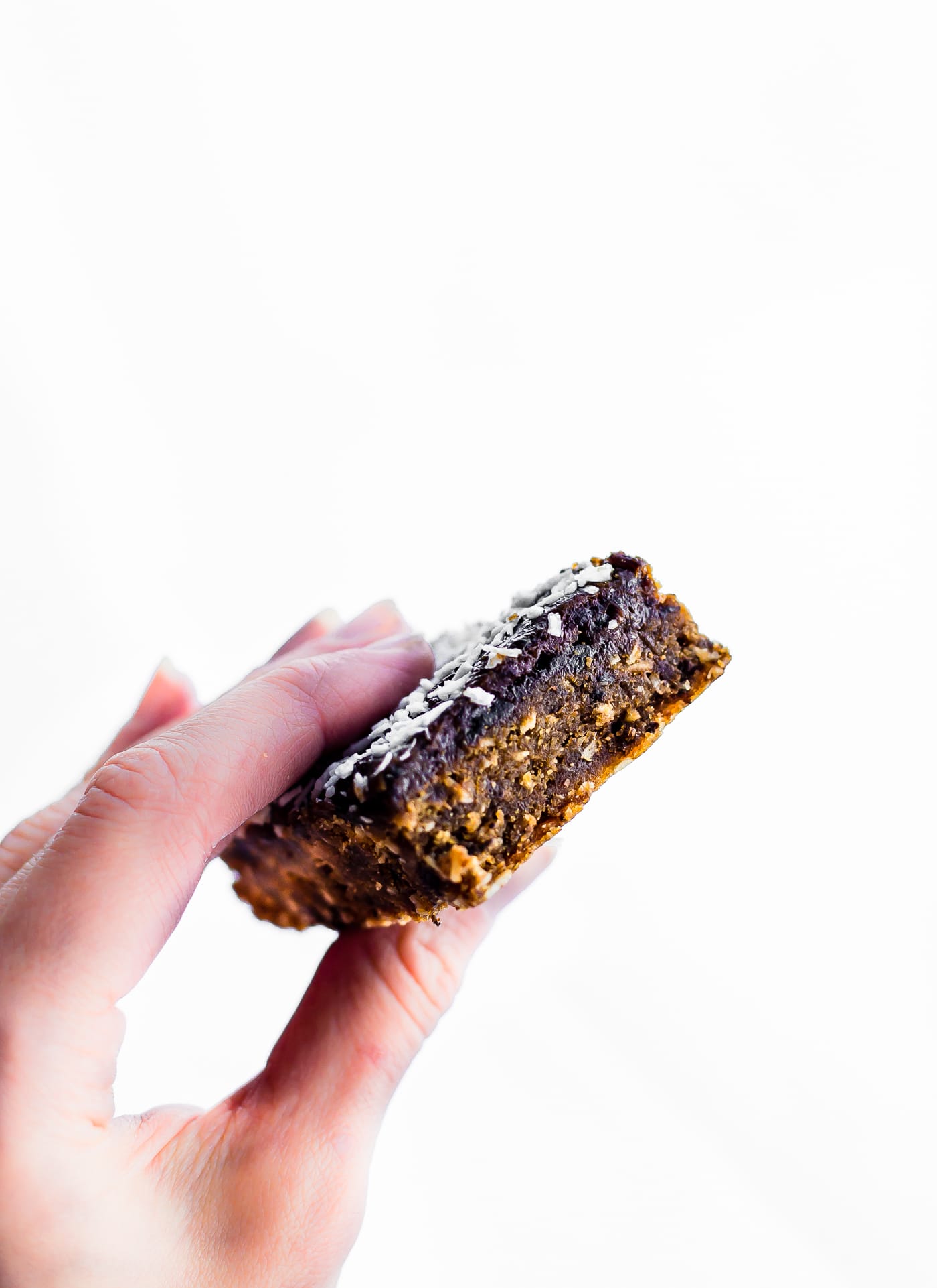 These Paleo Almond Butter Jelly Energy Bars are one of our favorite bars that fuel us for workouts and snacking on the go. Made with few ingredients; no oils and no sugar added. Blended and Baked in just 30 minutes, Which makes them pretty amazing! So chewy and flavorful that you'd never know they were healthy. Freezer friendly.