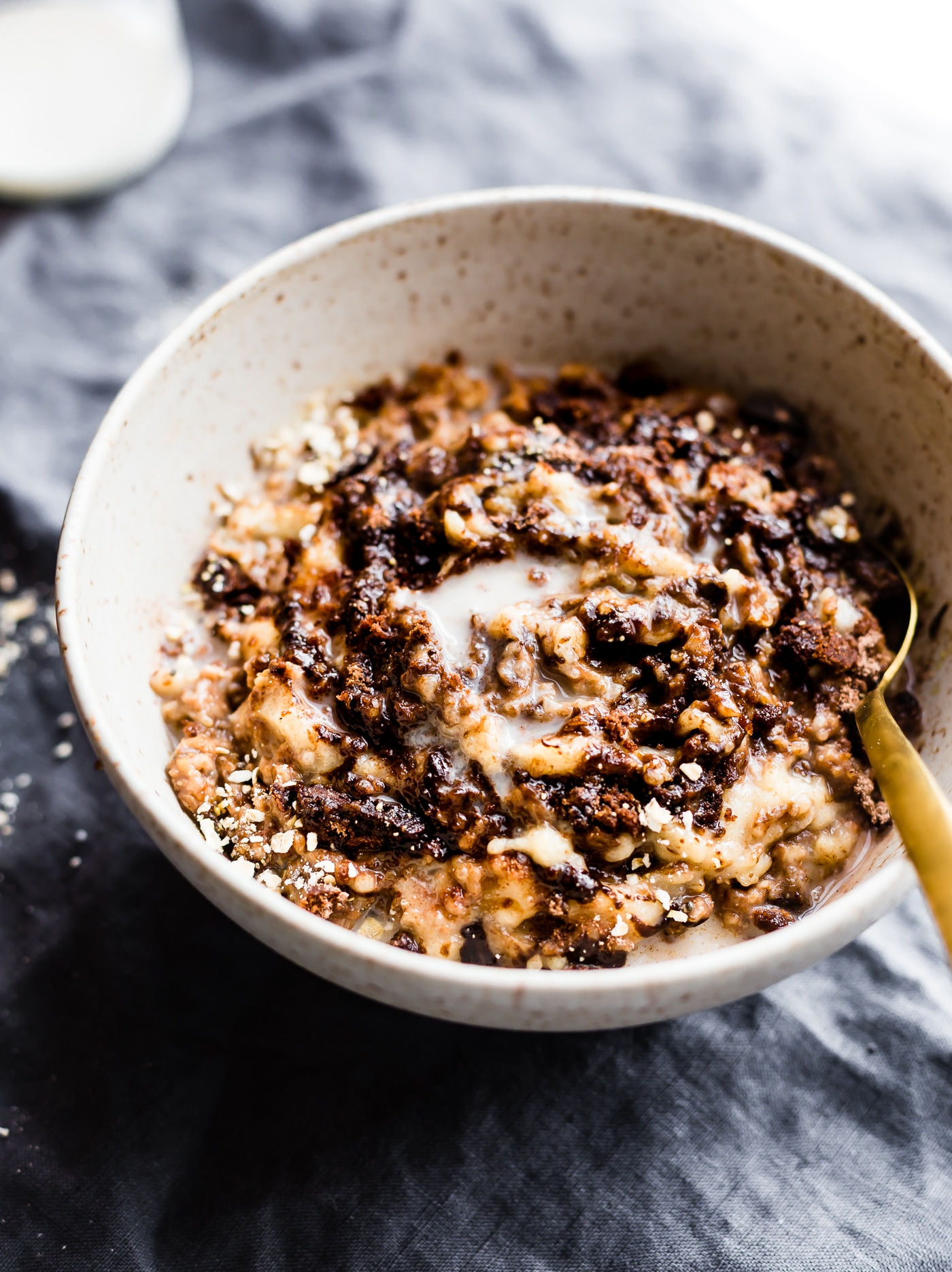 This dairy free Boston Cream Pie Banana Oatmeal is a gluten free "superfood" breakfast treat! A banana oatmeal recipe that tastes like dessert, yet satisfying and nourishing! Made with natural ingredients and packed with protein. Perfect for post workout recovery, a hearty breakfast, or just pure bliss