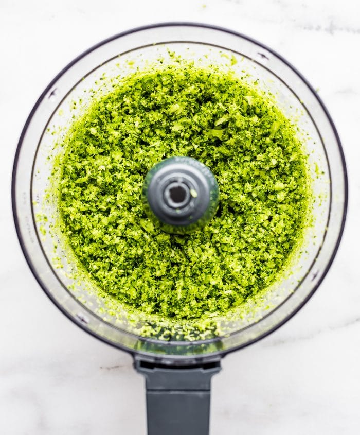 Finely chopped broccoli in food processor.
