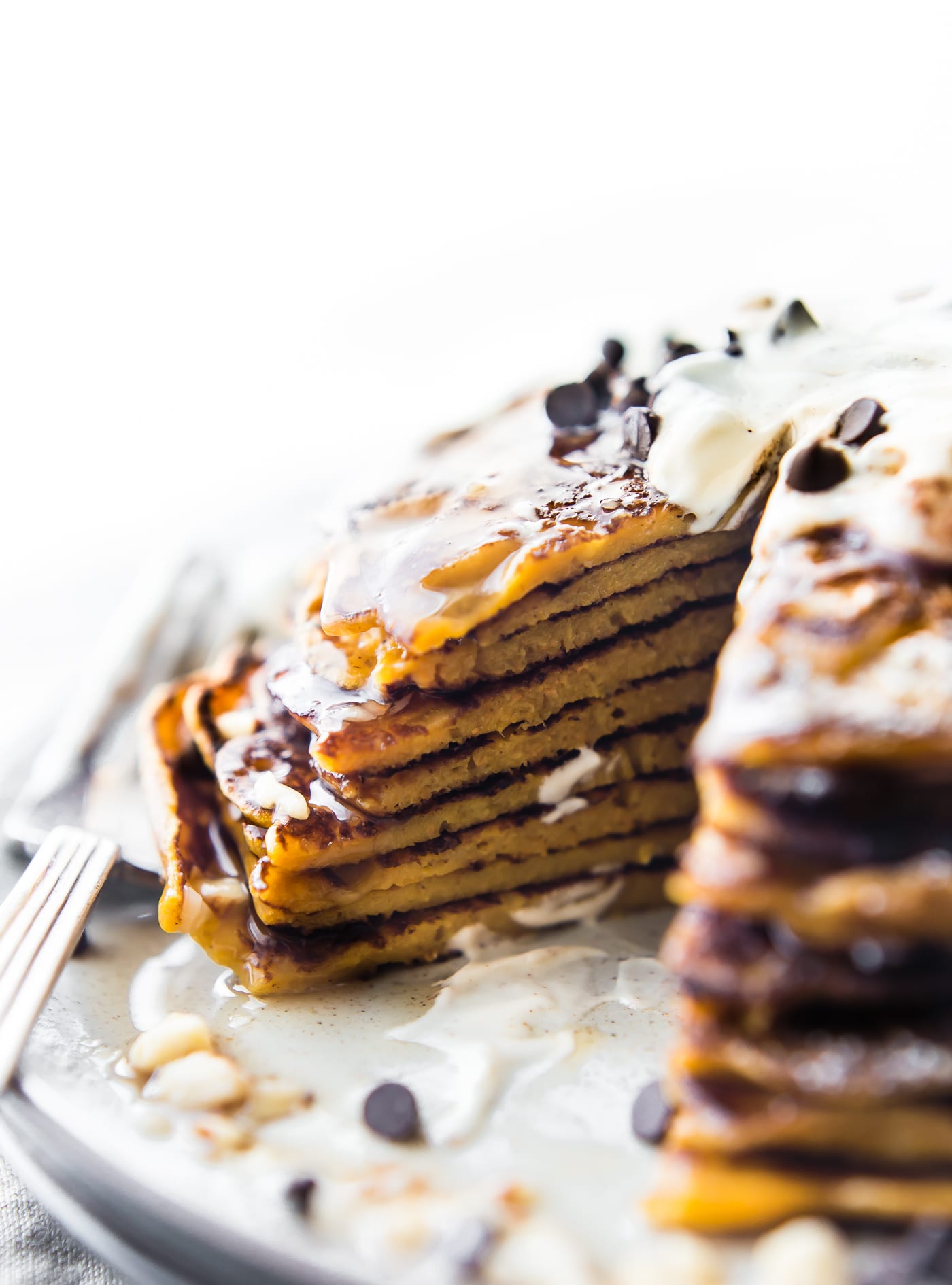 A Flourless Carrot Cake Yogurt Pancakes recipe that’s perfect for breakfast or brunch. These Flourless Carrot "Cake" Yogurt Pancakes are too good to be true! Made with siggi’s vanilla yogurt, making them lower in sugar, gluten free, and protein packed! An easy blender recipe.
