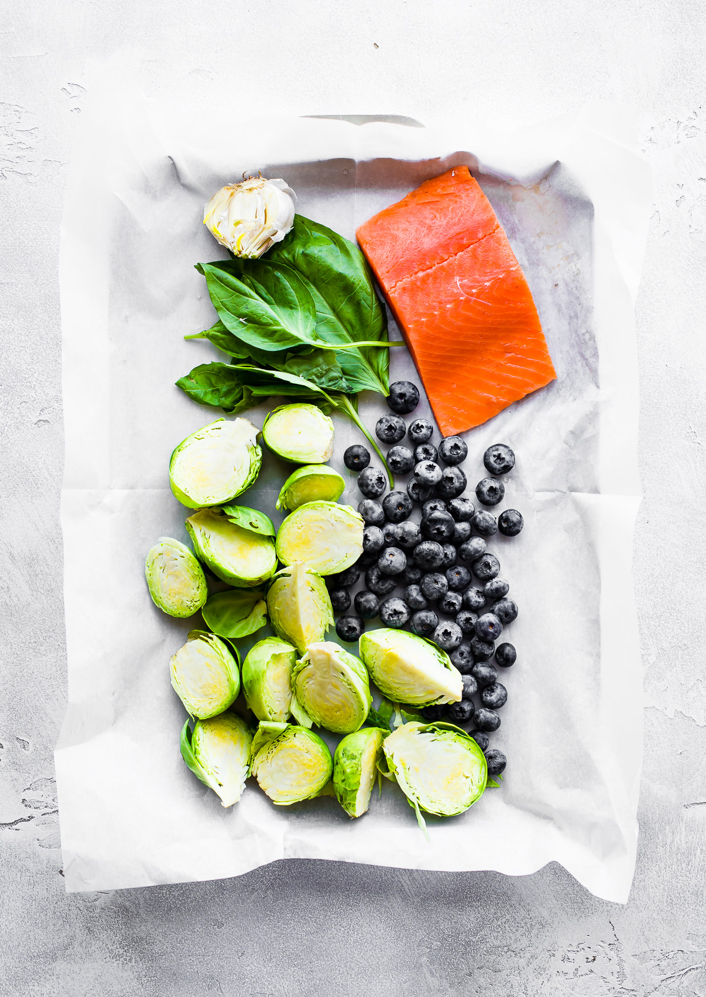 One pan Paleo SUPERFOOD Baked Salmon! This baked salmon recipe is ready in 20 minutes and packed full of nutrients. A nourishing, whole 30 friendly, flavorful meal! And all it takes is just a few simple real food ingredients.