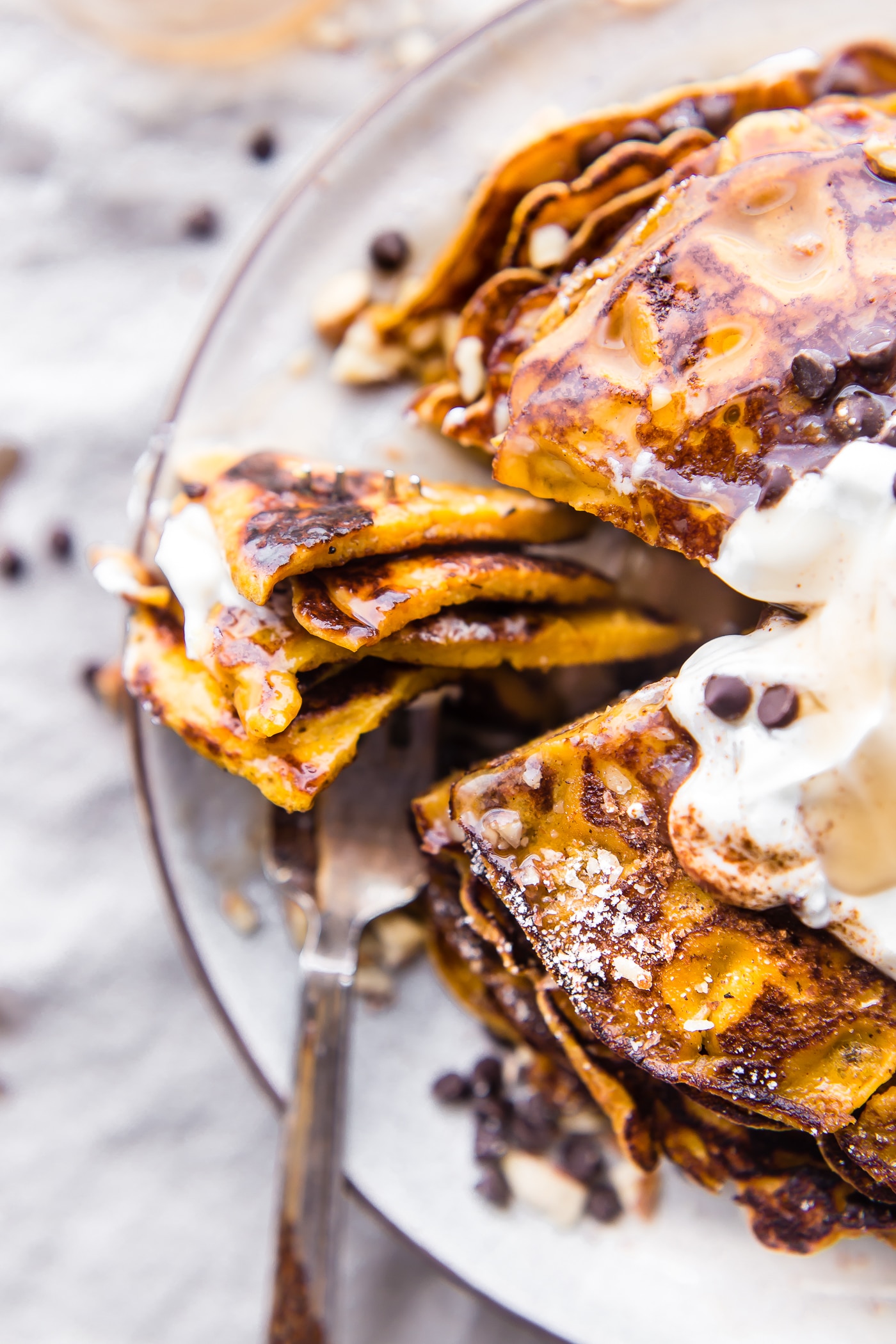 Flourless Carrot Cake Yogurt Pancakes - perfect for breakfast or brunch. Made with siggi’s vanilla yogurt, making them lower in sugar, gluten free, and protein packed! An easy blender pancakes recipe.