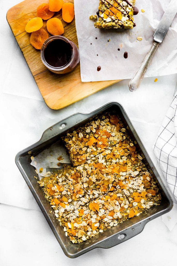 No Bake Apricot Oat Protein Bars easy to make, wholesome, and nut free! Made with dried apricots, gluten free oats, protein, & seeds! Sweet, chewy, vegan!