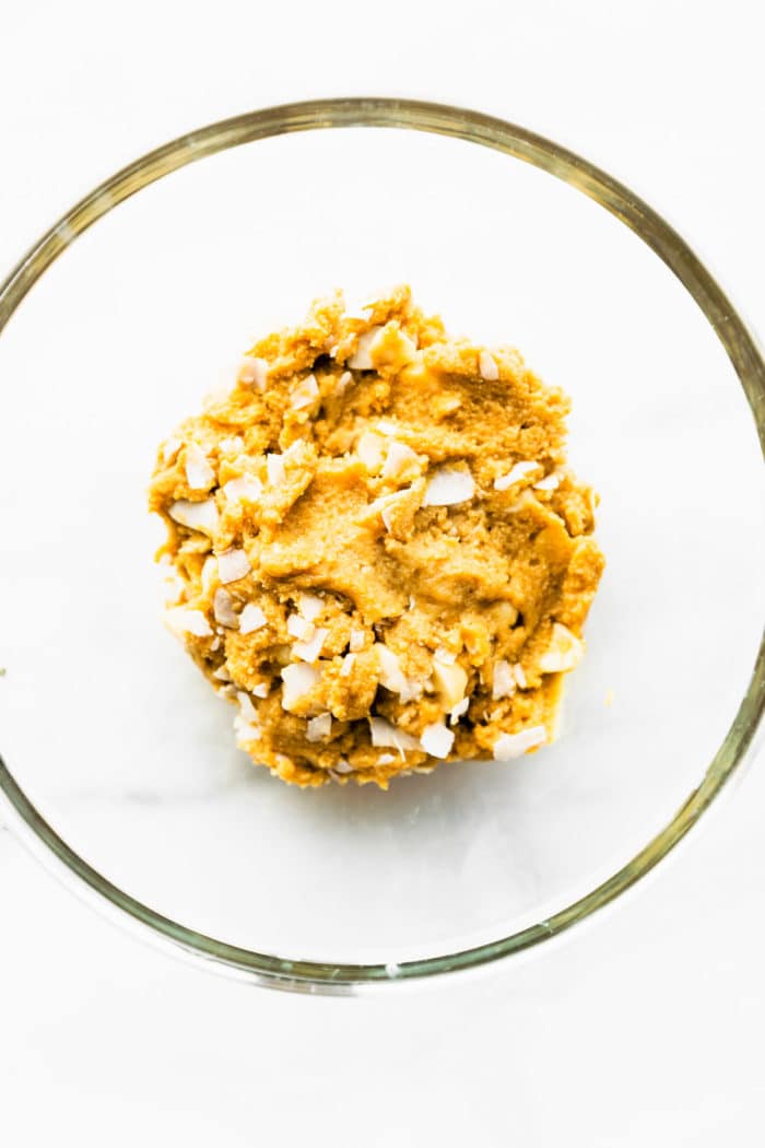 coconut cookie dough in glass bowl