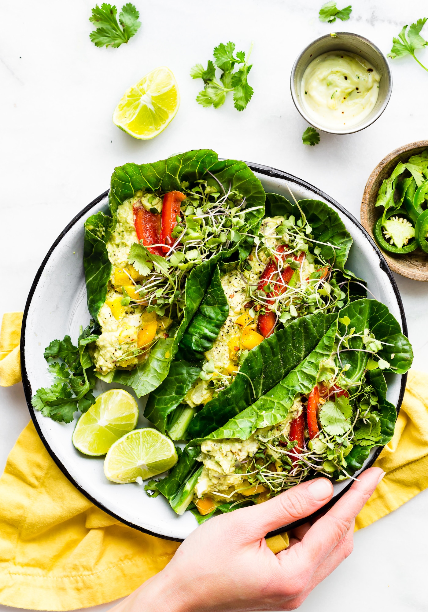 Spice up lunch with these Paleo MEXICAN AVOCADO EGG SALAD COLLARD GREEN WRAPS! A quick veggie packed lunch!