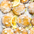 macadamia nut cookies with lemon glaze on baking sheet