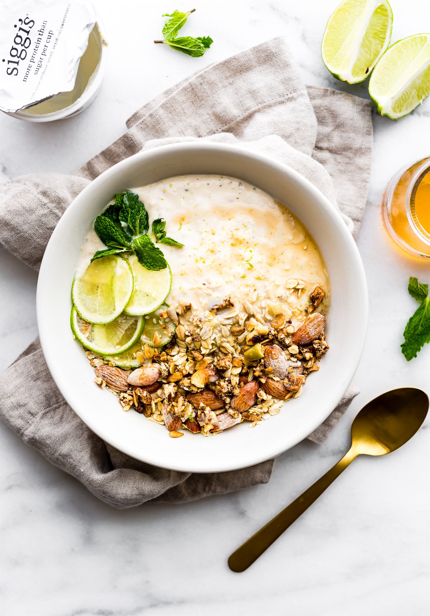 : This Zesty Tropical Yogurt Overnight Muesli recipe is the perfect make ahead breakfast bowl! Gluten- free, nutrient rich, and made with siggi's yogurt for a protein boost! #Partnering with @siggisdairy!