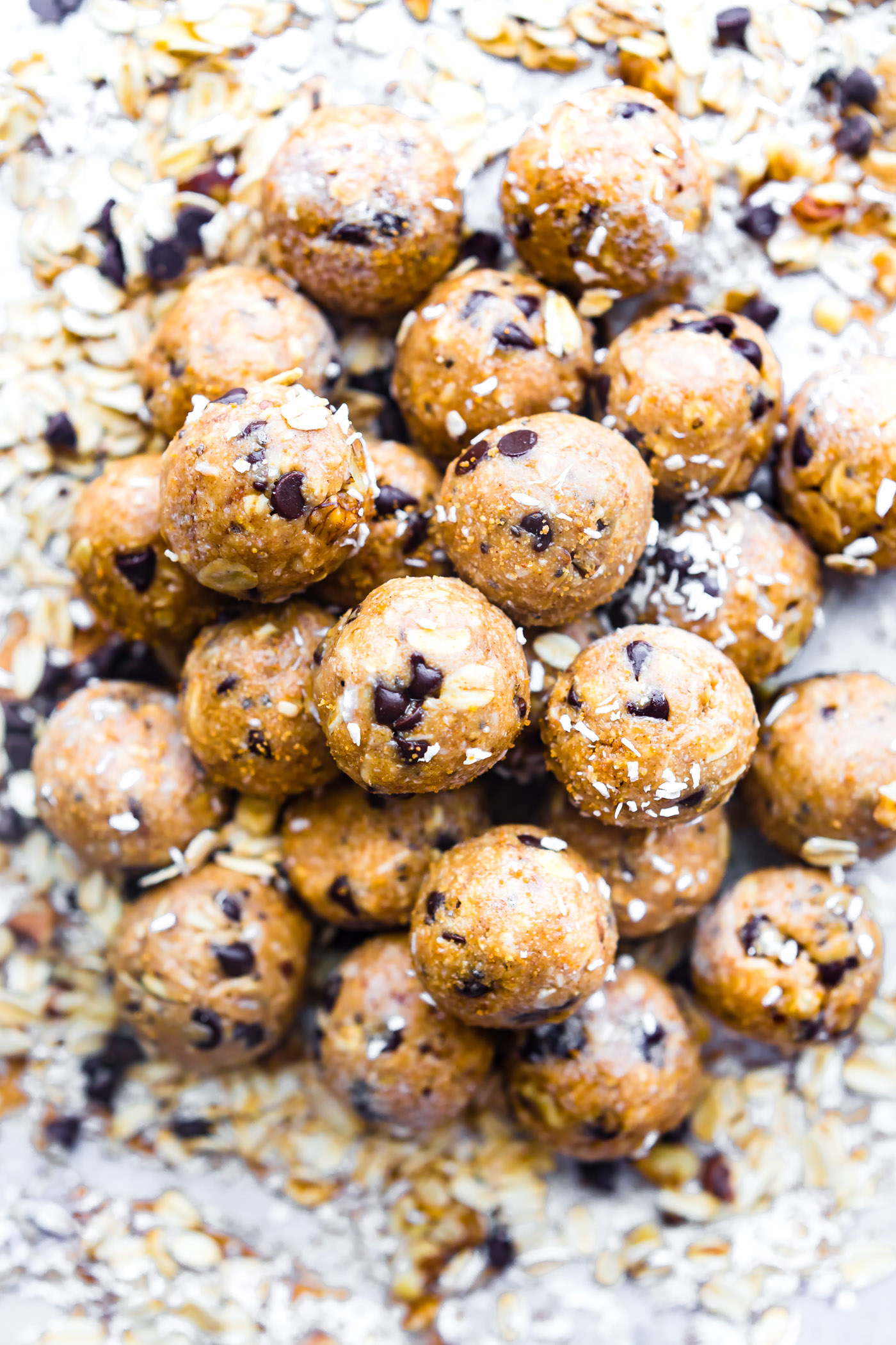 Cowboy Cookies in a no bake ENERGY BITES form! Yes, the best of both worlds. No baking, vegan energy bites that taste like cowboy cookies! Soft, chewy, and loaded with a variety of flavors. Gluten free!