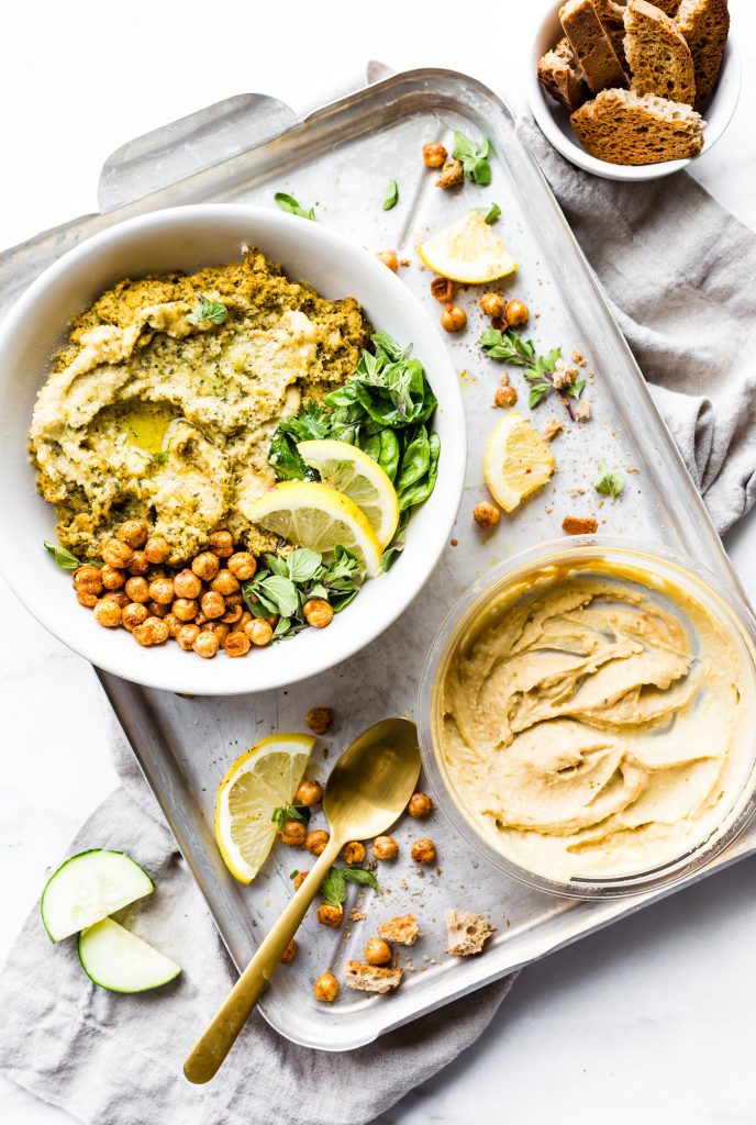 Warm Mediterranean Spinach Artichoke Hummus Dip is a meal in itself. A vegetarian Mediterranean Baked Hummus Dip that's wholesome and healthy. Simple real food ingredients that you blend and bake! Gluten free, plant based.