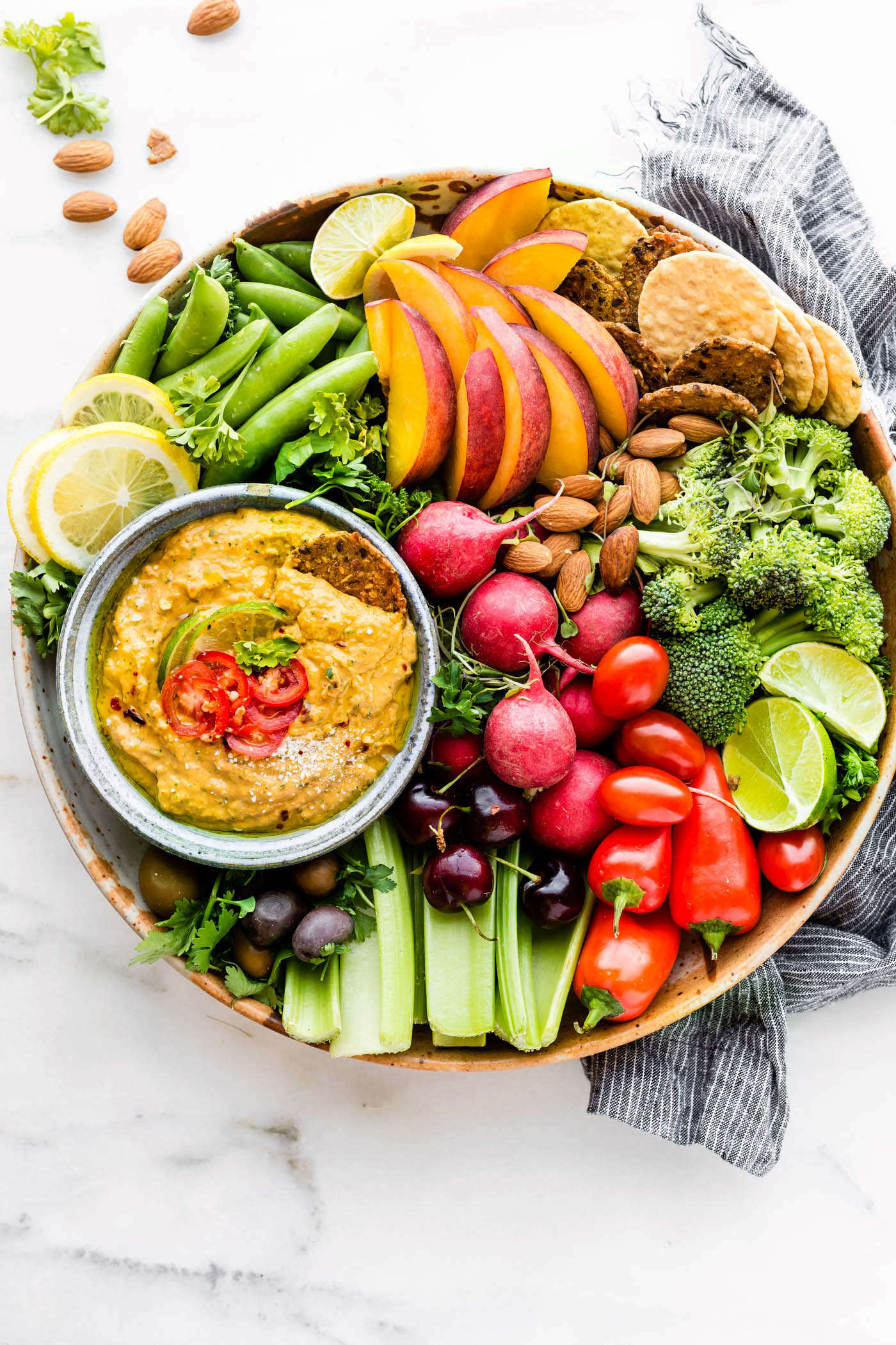 This Spicy mango avocado yogurt dip is NOT your average healthy appetizer! It’s A NEW TASTY way to eat veggies! Mango, yogurt, avocado, and a kick of spice from chilis makes this easy snack recipe a protein rich dip!