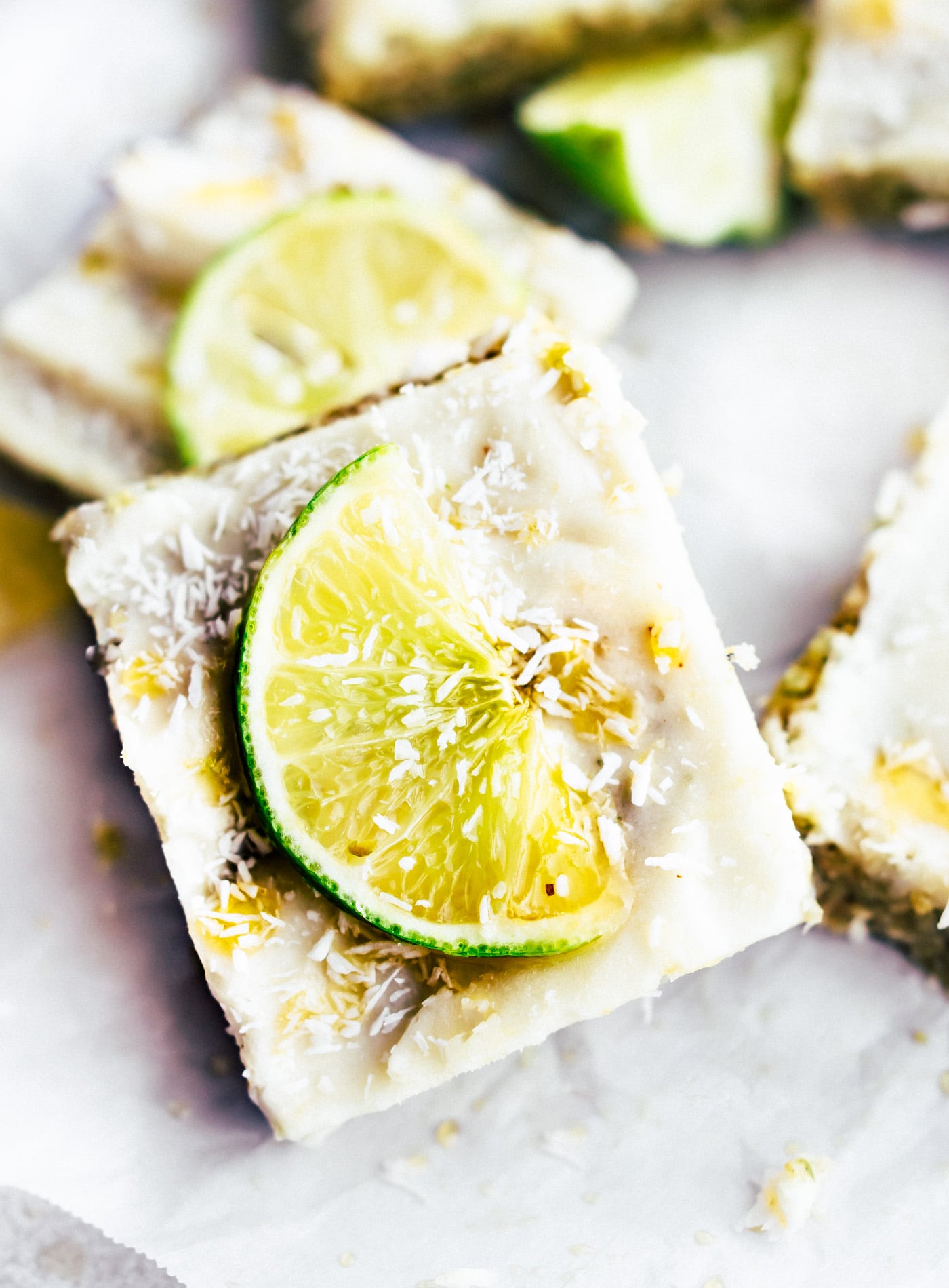 Tropical Cashew No Bake Snack Bars is a vegan, paleo, healthy snack bars recipe, inspired by my love for Hawaiian flavors! With dried pineapple, cashew, coconut, lime, and a coconut glaze, this easy dessert style snack bars recipe has an explosion of tropical flavor!