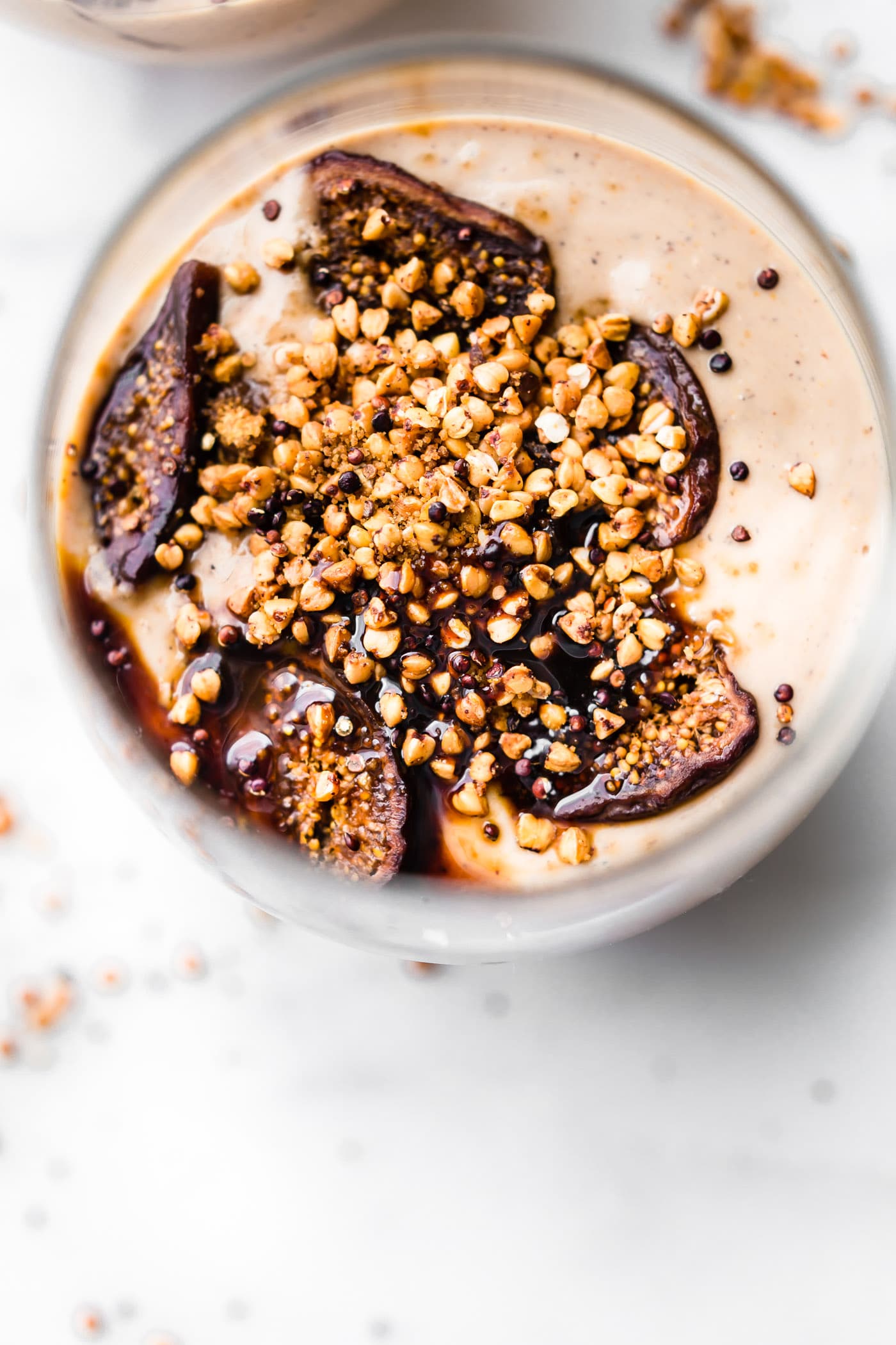 Creamy Fig Yogurt Breakfast Parfait Cups! A healthy gluten-free breakfast with a fiber boost! A Blended Yogurt Cup with dried California Mission Figs, chia seed, a drizzle of molasses, and a cinnamon toasted Buckwheat topping! Ya'll, this is so heavenly! Simple ingredients, energizing, quick to make, and oh so delicious