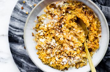 bowl of Pumpkin Quinoa Breakfast Porridge with Coconut Cream