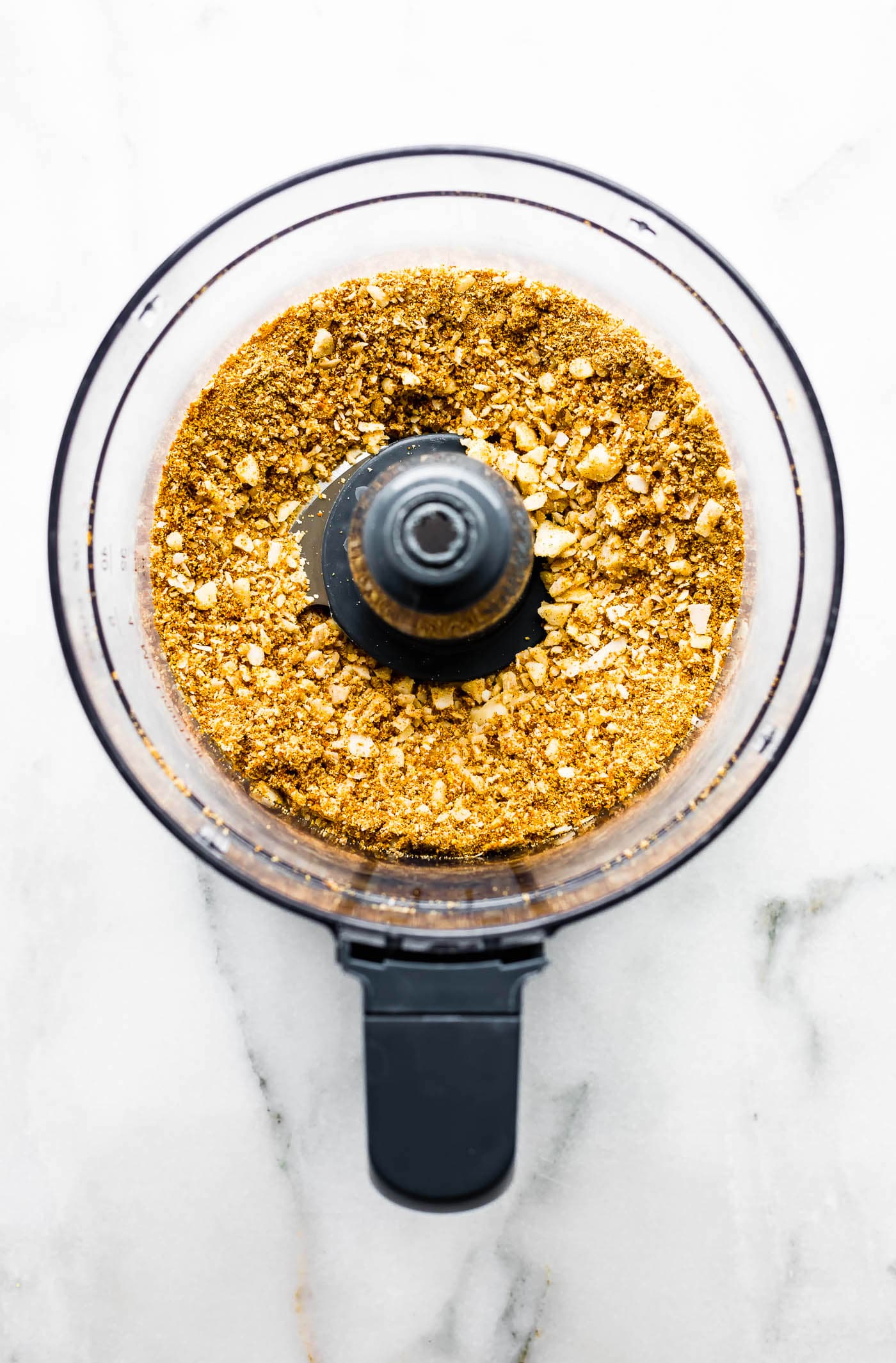Ground nut topping in a food processor for vegan sweet potato casserole