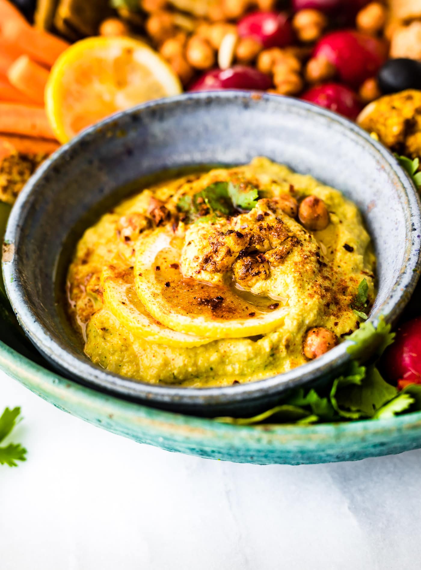 This Tandoori Roasted Cauliflower dip is a flavorful creamy vegetable dip that is perfect for snacking, appetizers, or small plates. Greek yogurt, homemade tandoori seasoning, roasted cauliflower, and parmesan make this dip filling and healthy!