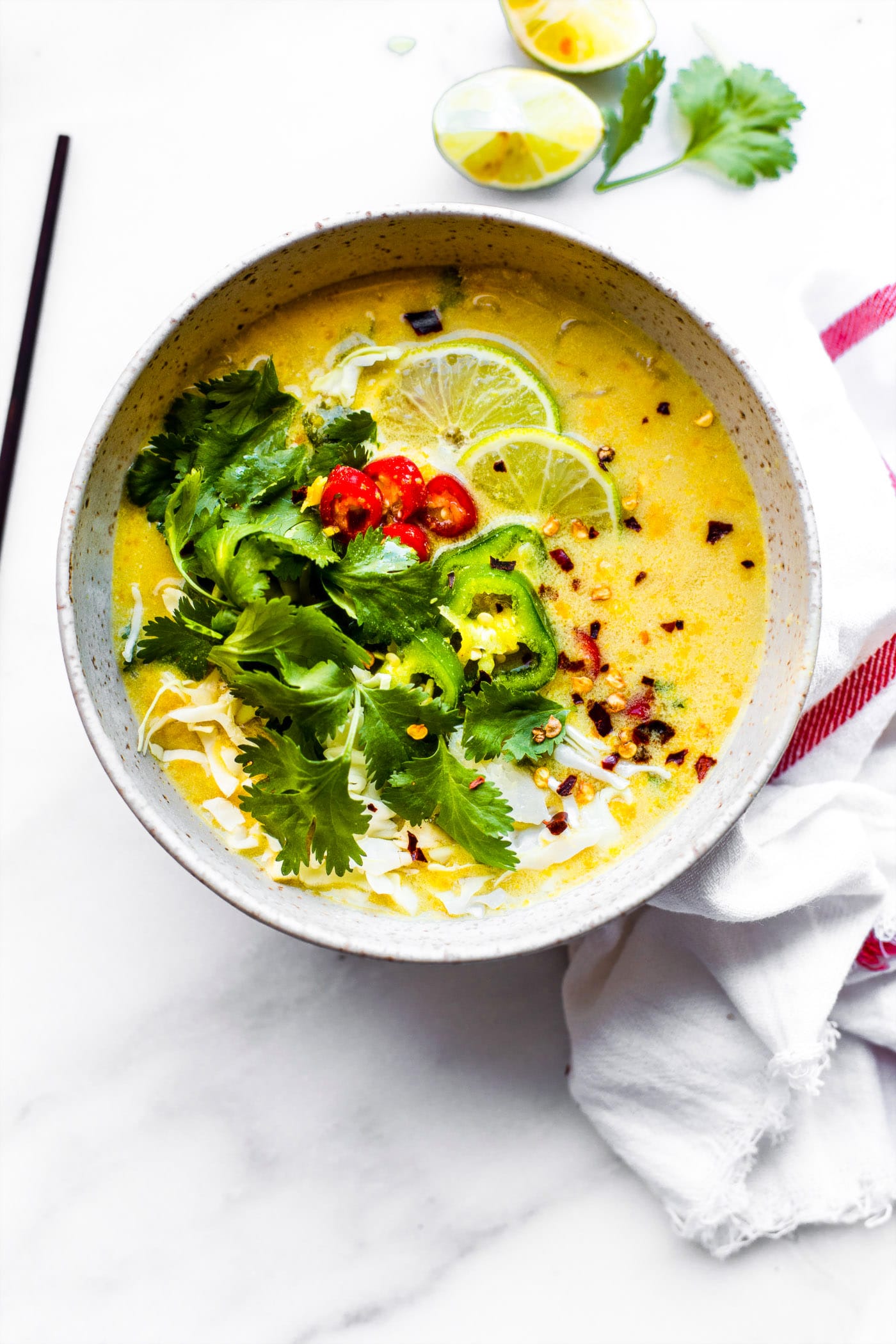 Thai Coconut Milk Cabbage soup packed with flavor and nourishment! A Thai Coconut Paleo soup recipe made with real ingredients; coconut milk, cabbage, lemongrass, broth, curry, and Thai Chili peppers. It is quick to make, plus it keeps you warm during winter! Vegan friendly.