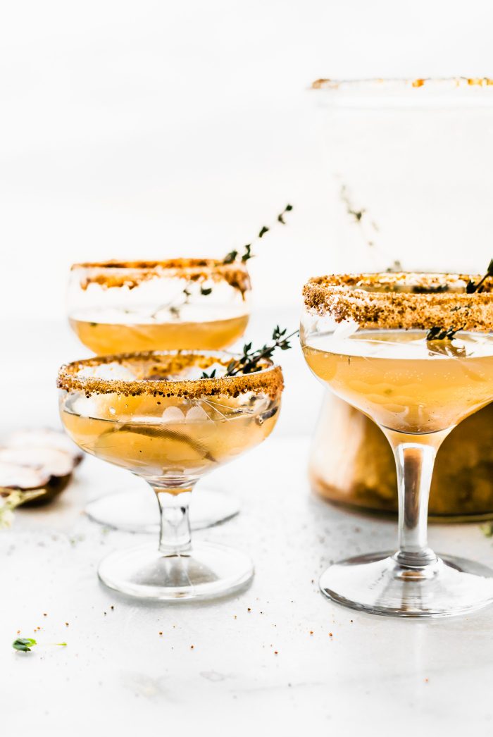 Celebrate the season with these Honey Roasted Pear Sparkling Cocktails and Mocktails! The easiest festive cocktails made with sparkling wine, champagne, or grapefruit juice, then blended with a honey roasted pear puree, honey, cinnamon and nutmeg, and a touch of vanilla! Simple, light, delicious.