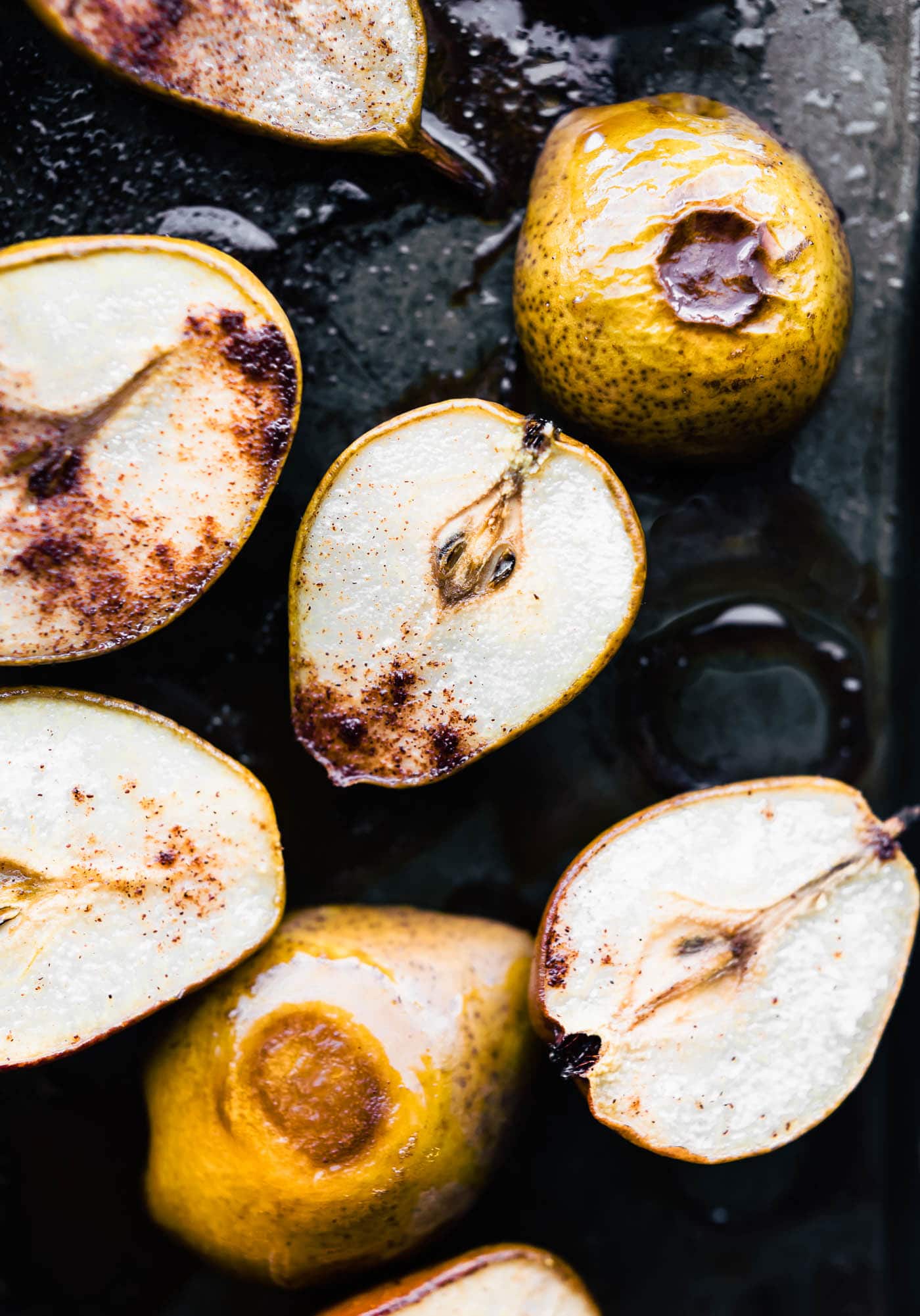 baked pears on sheet plan, sliced with spices