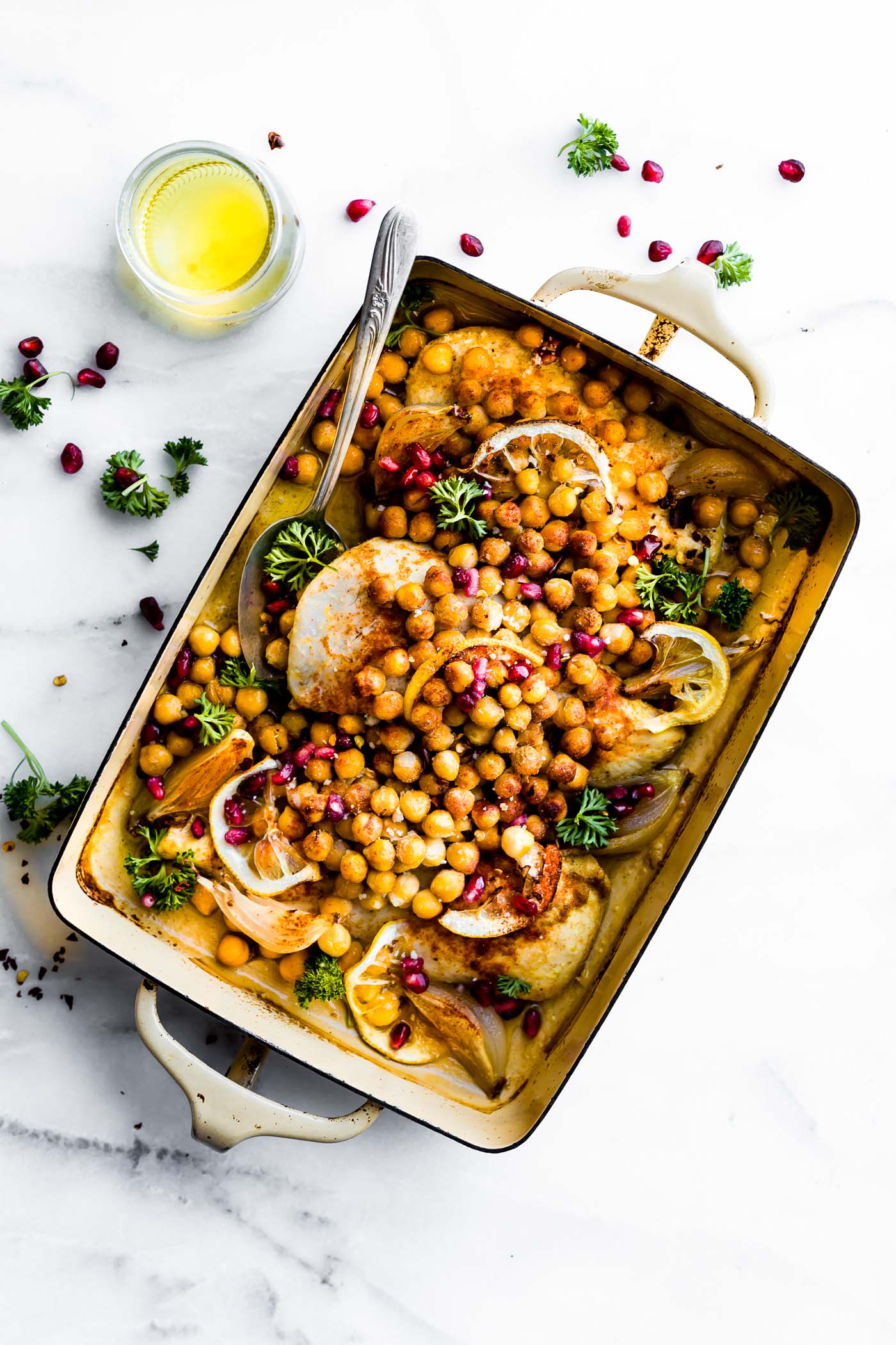 Overhead view casserole dish with cumin roasted chickpea chicken