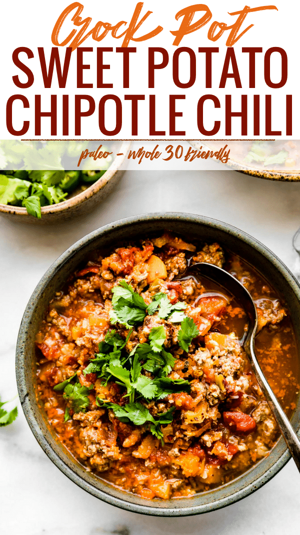 Overhead view stone bowl filled with slow cooker sweet potato chipotle chili topped with cilantro