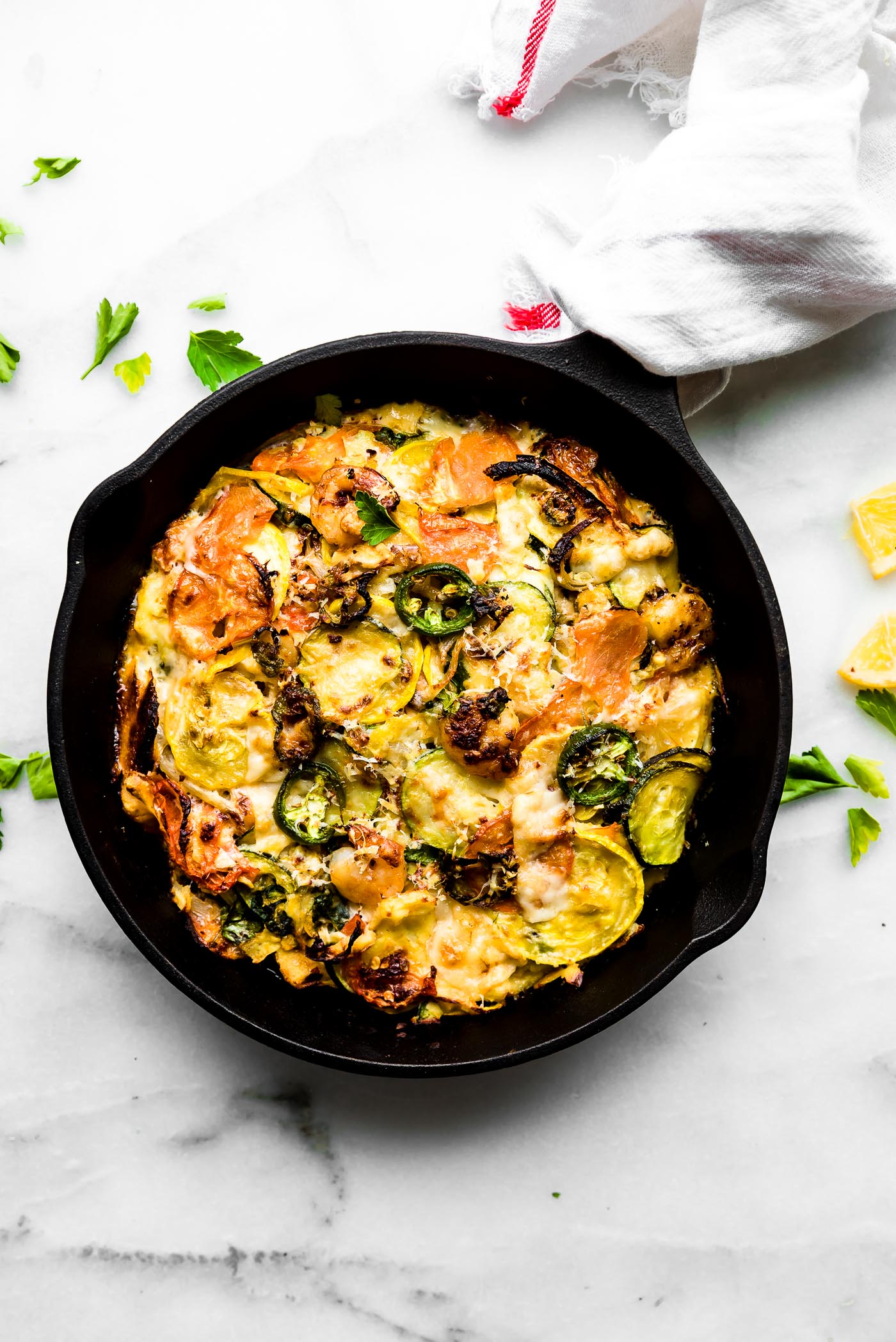 grain-free veggie bake with spicy shrimp in a skillet