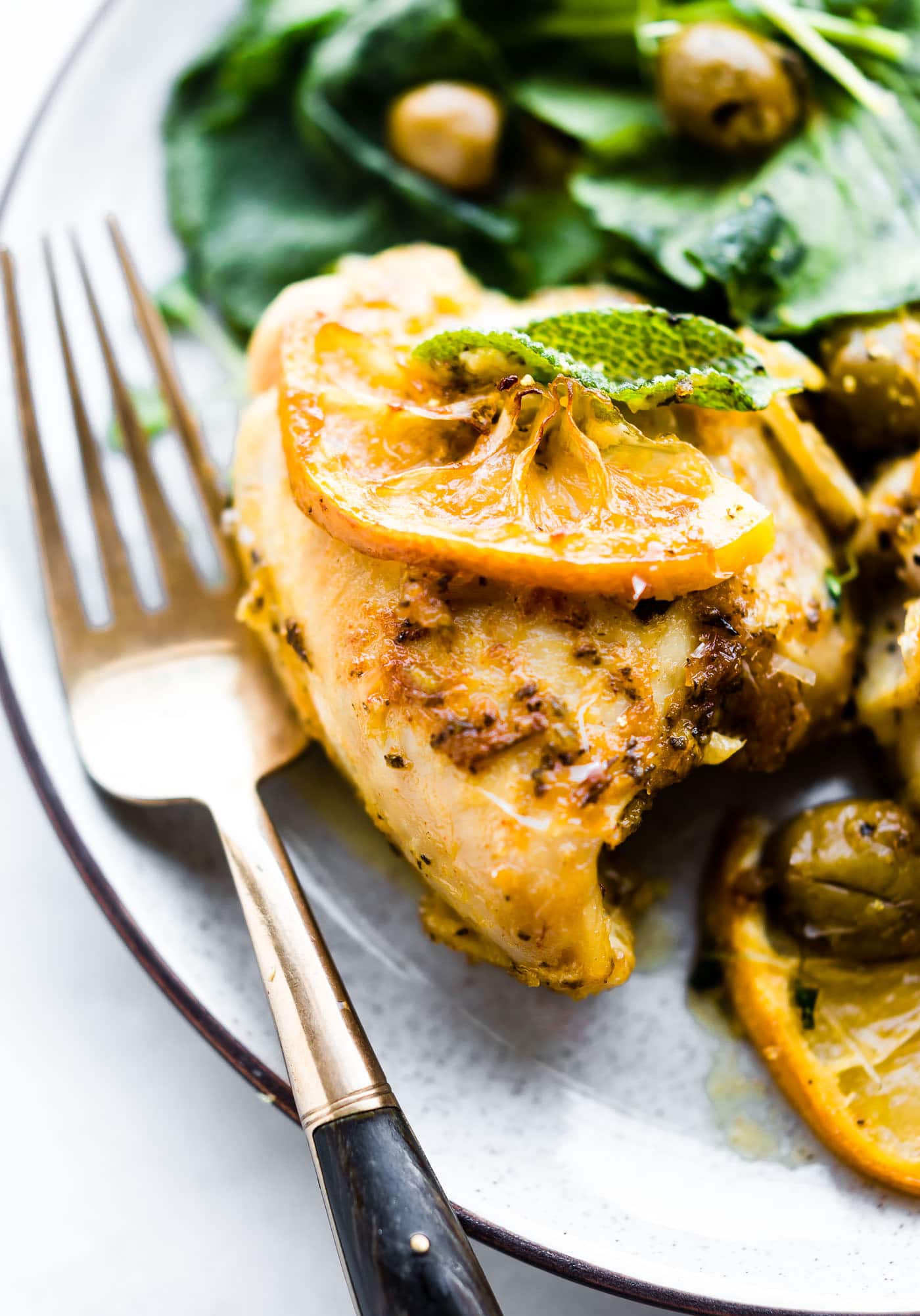 Lemon Sage Baked Chicken and Olives on a plate