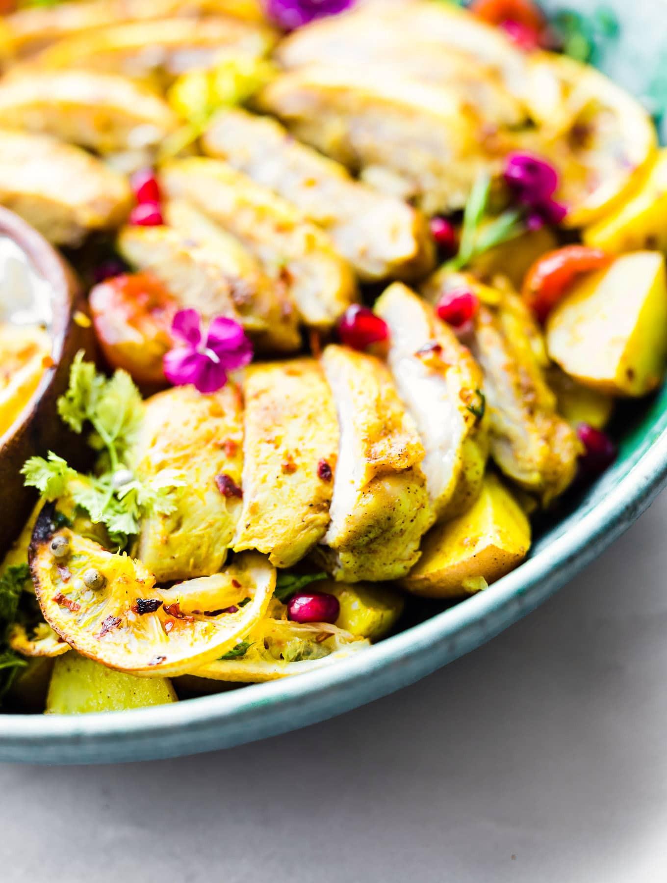 Pan roasted chicken thighs with Persian spices, a burst of lemon flavor and tender veggies! This Persian Spiced Pan Roasted Chicken is an easy one pan meal