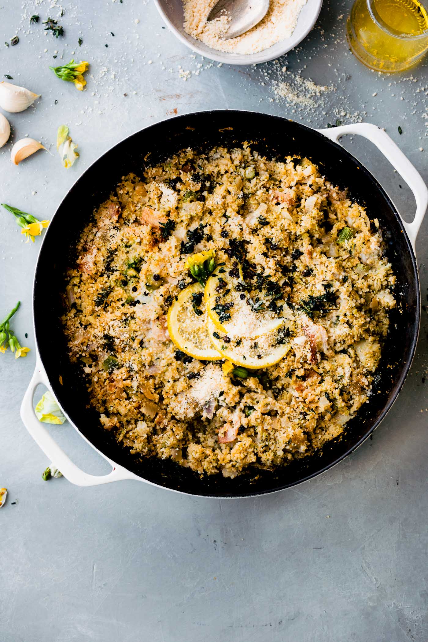 skillet of healthy cauliflower rice and riced broccoli casserole