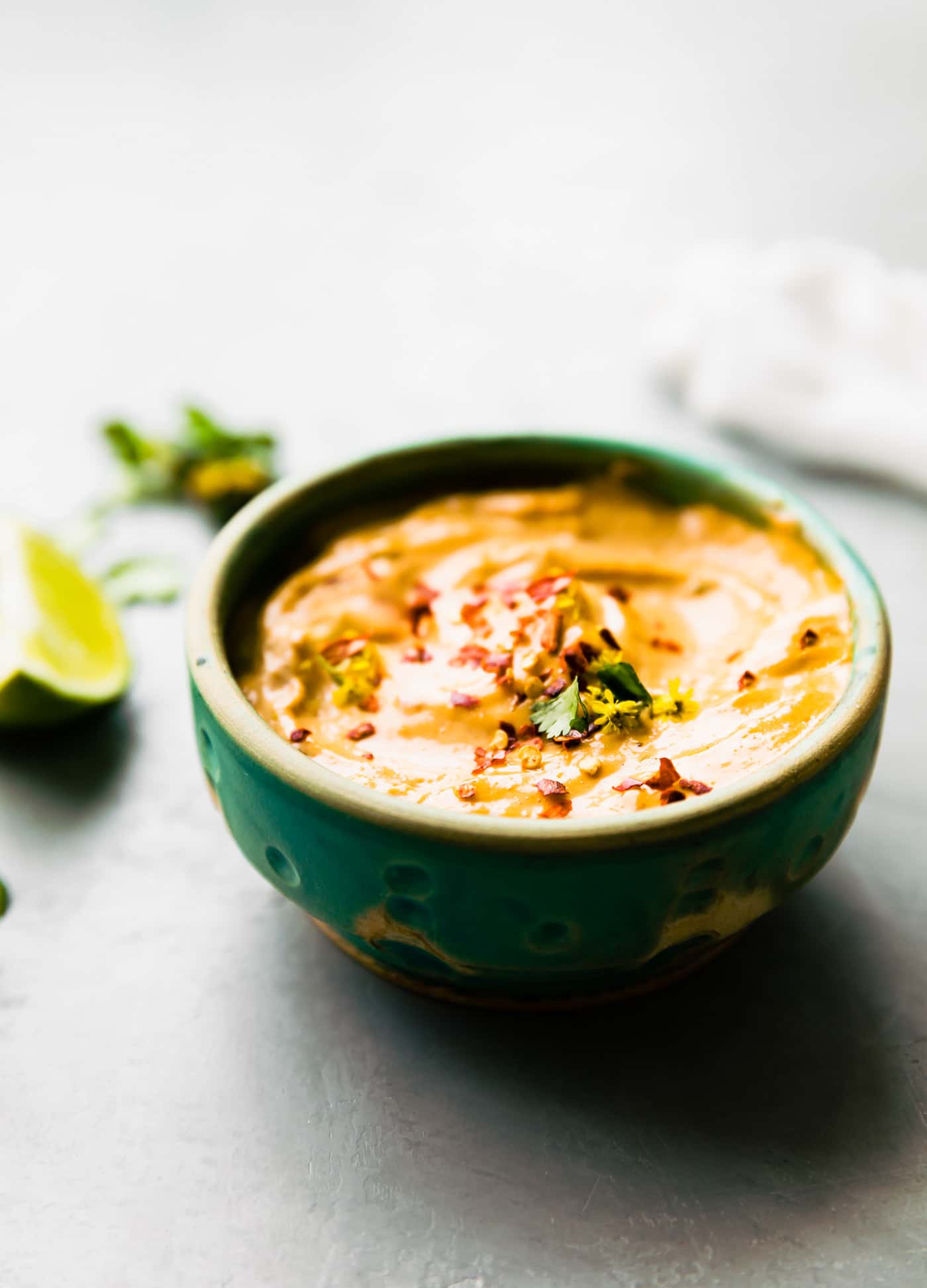 homemade chipotle mayo in bowl with spices on top