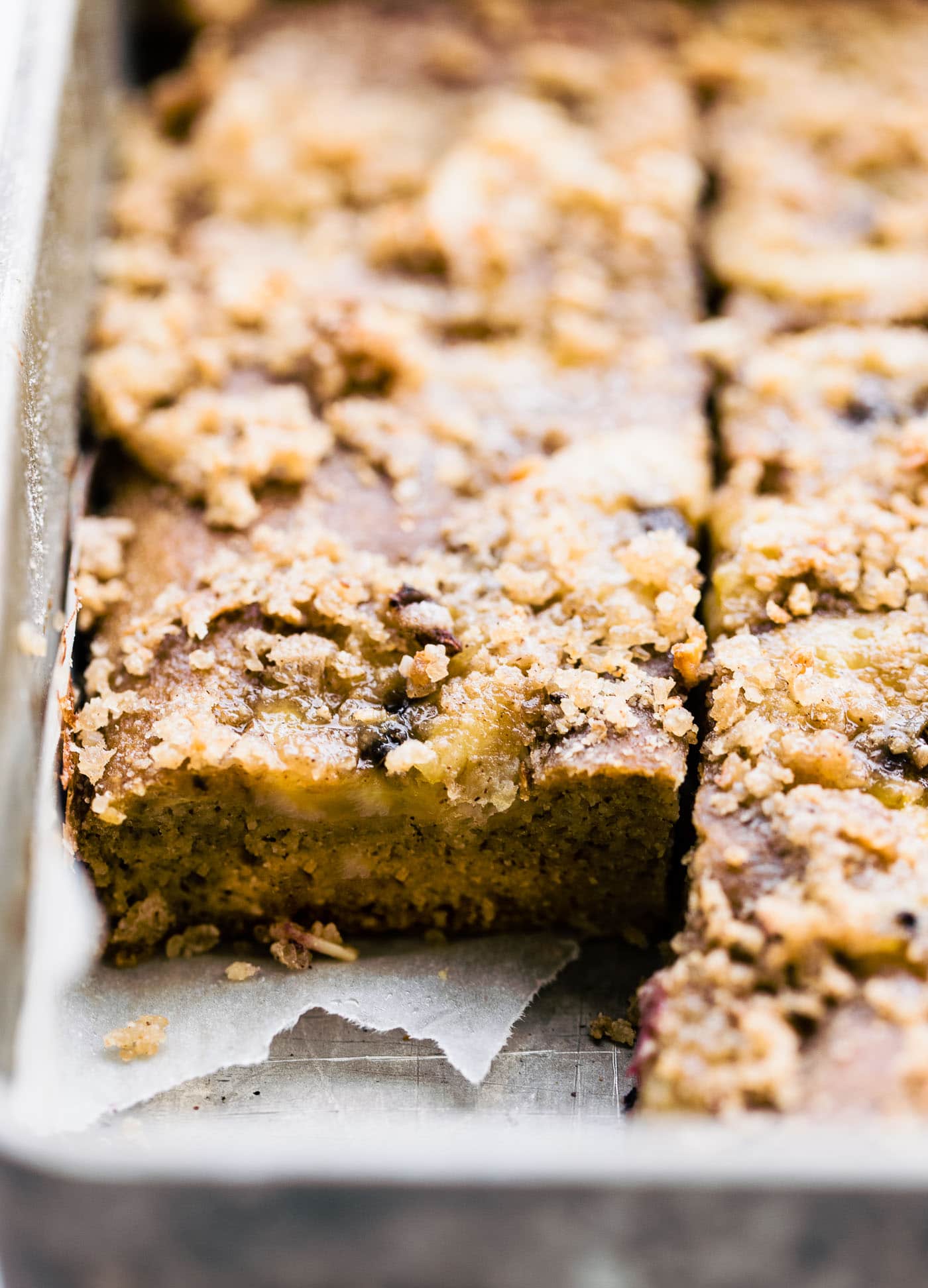 flourless banana bread sliced in squares & topping