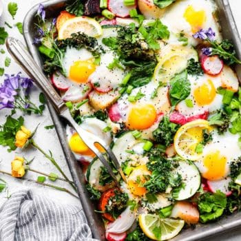 Baked Eggs with Roasted Spring Vegetables is an easy sheet pan meal for breakfast, brunch, or dinner. It's a great way to enjoy the harvest of spring veggies with a boost of protein from organic eggs! This is a gluten-free, lower carb, vegetarian recipe with a Paleo/Whole 30 option, too! 
