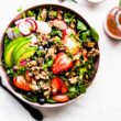 overhead image: strawberry spinach salad with granola croutons
