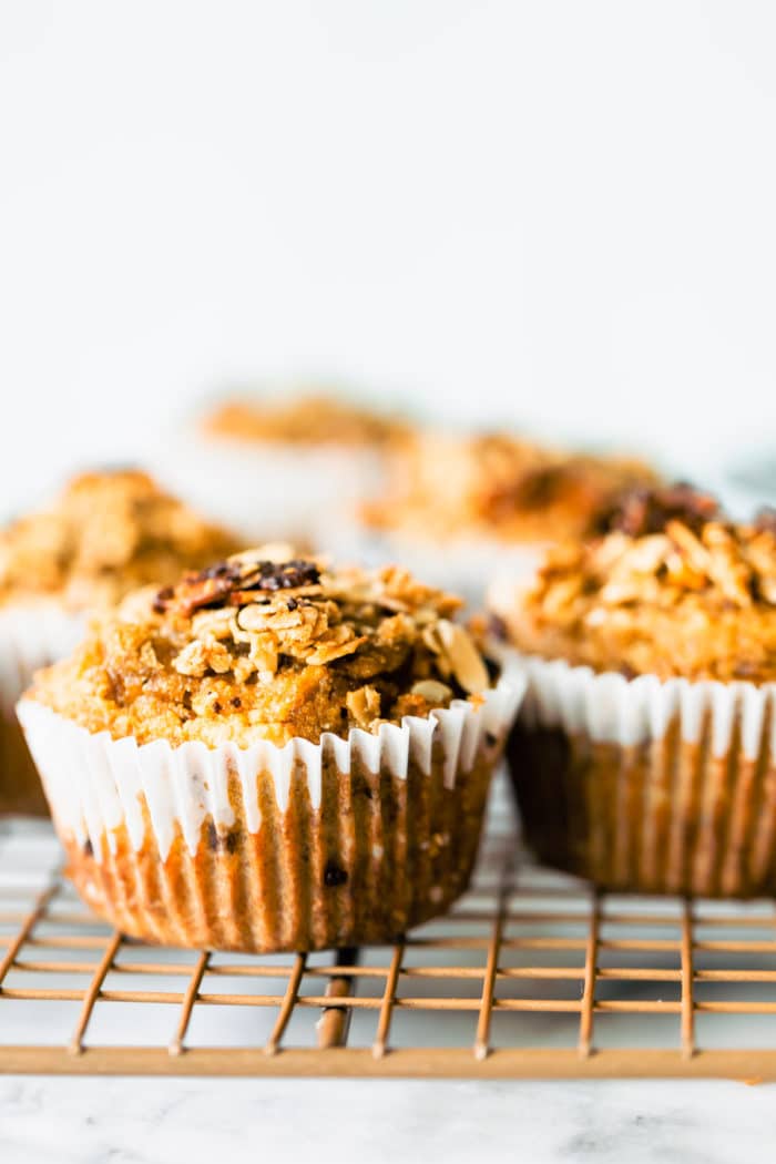 Side view healthy breakfast muffins on cooling rack