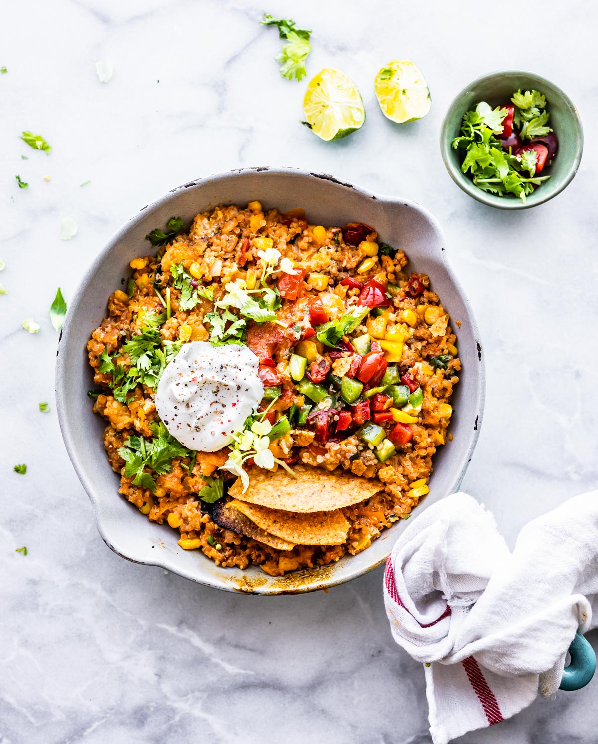 mexican quinoa skillet dinner topped with sour cream
