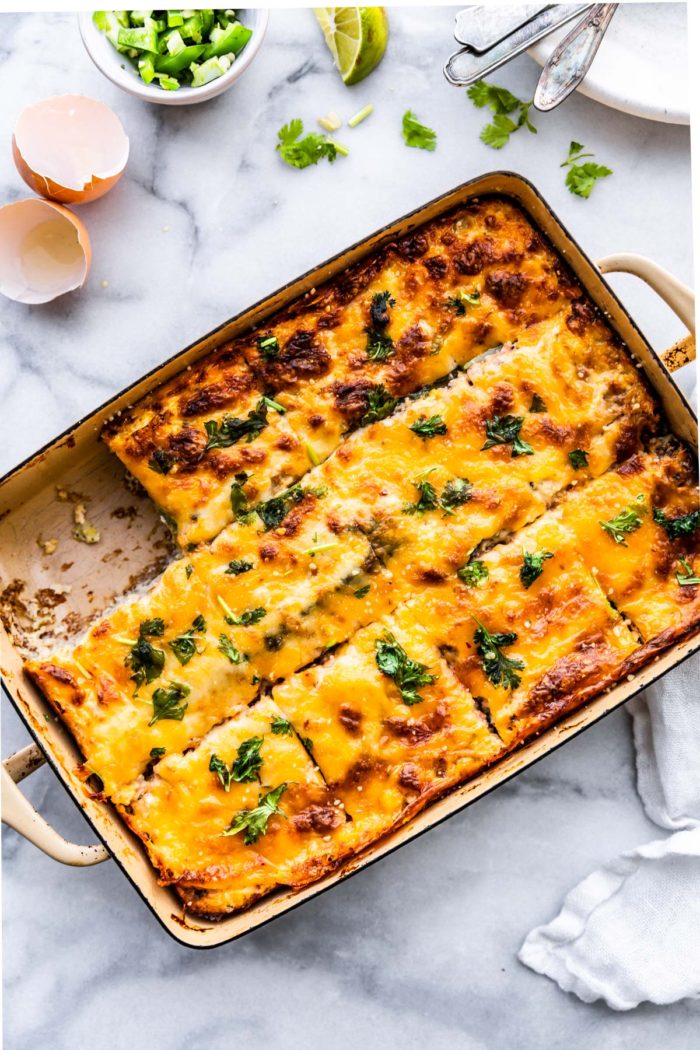 egg casserole with utensils on table