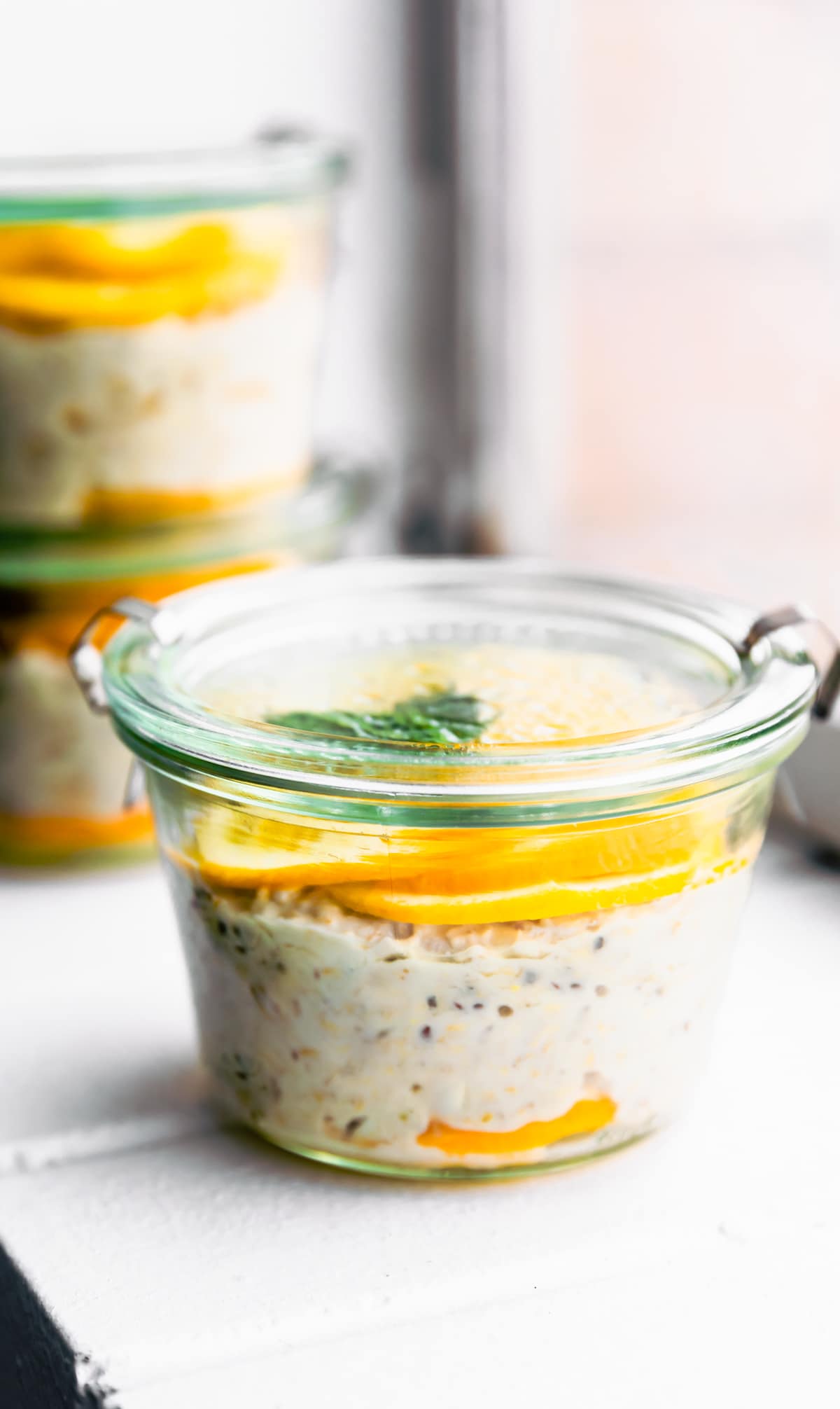 orange vanilla overnight oats in jar with lid