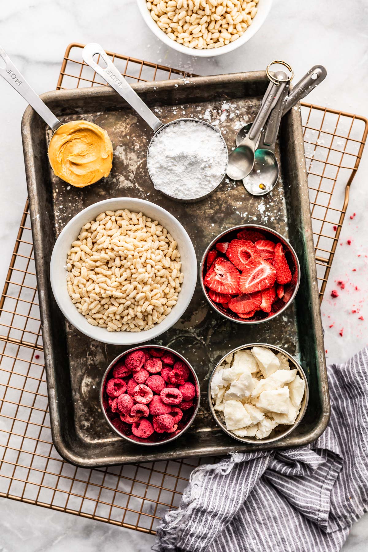 ingredients for white chocolate rice crispy bars with raspberries.