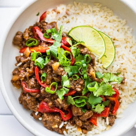 gluten free Asian beef dinner with white rice on white plate