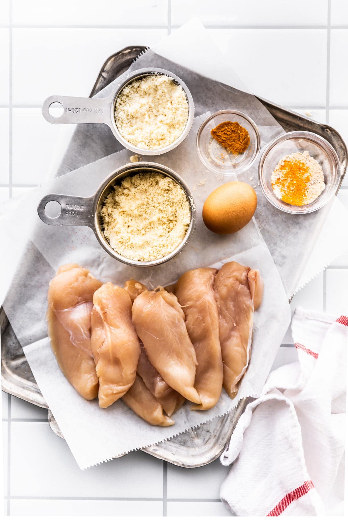 ingredients on sheet pan to make an air fryer chicken recipe