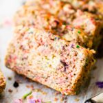 close up photo: slice of vegan ice cream bread with colored sprinkles