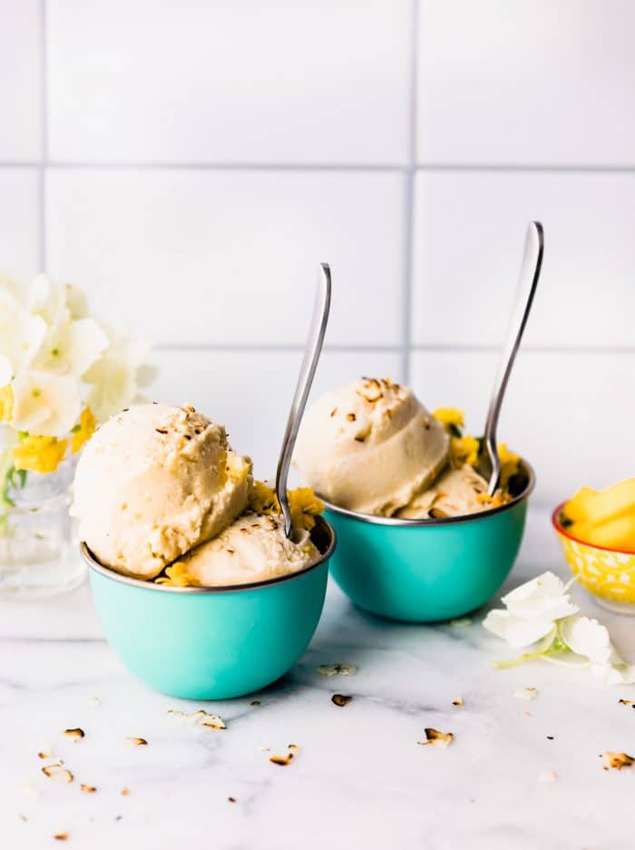 2 robin's egg blue ice cream bowls with spoon and 2 scoops of banana nice cream