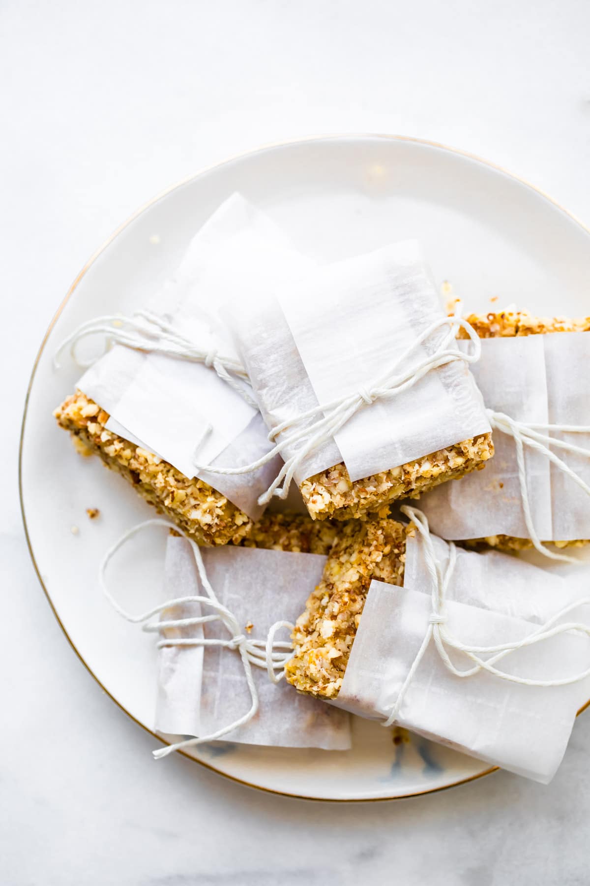 frosted no bake protein bars on a plate