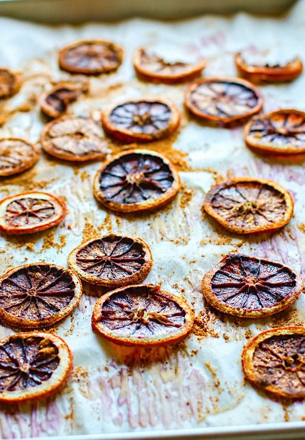 Oven dried orange slices. Slightly sweetened oven dried orange slices sprinkled with spices and coconut sugar. Great with cocktails, garnishing, or cereals.