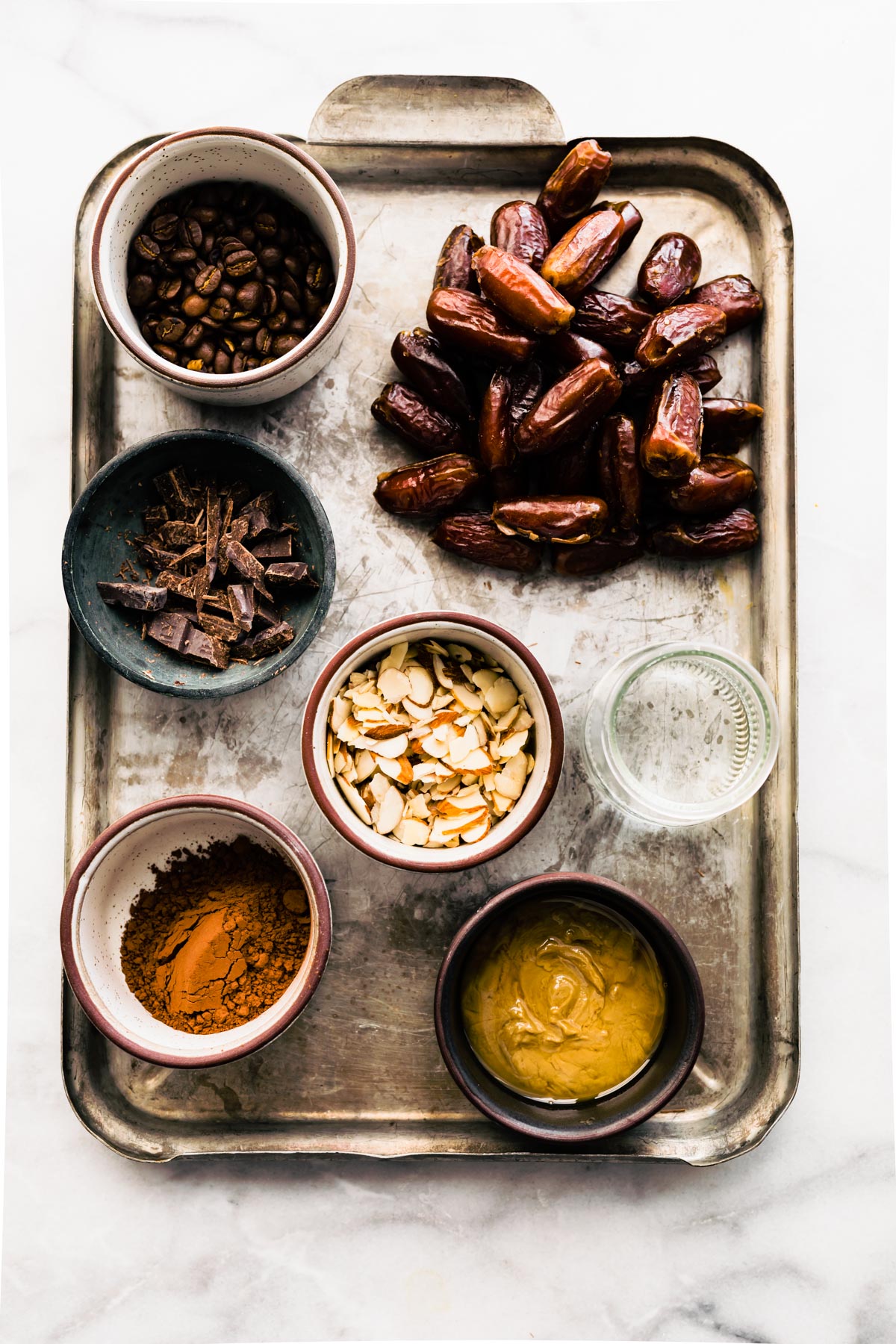 overhead: ingredients in prep bowls to make almond mocha fudge recipe