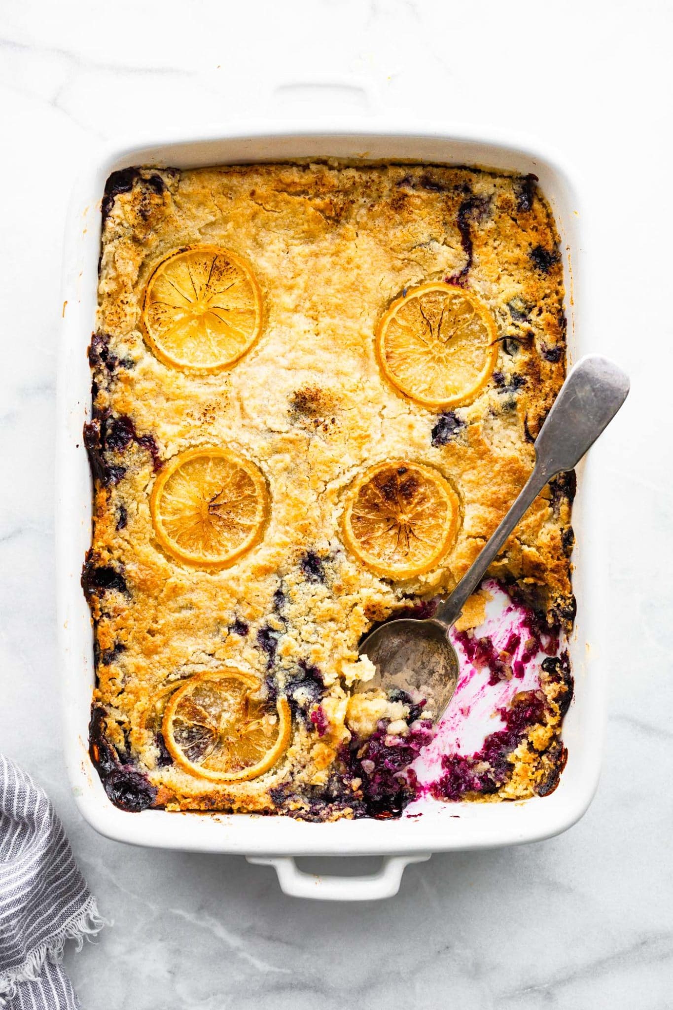 Overhead image of lemon blueberry cake in baking dish