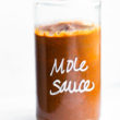 Homemade mole sauce in a glass jar